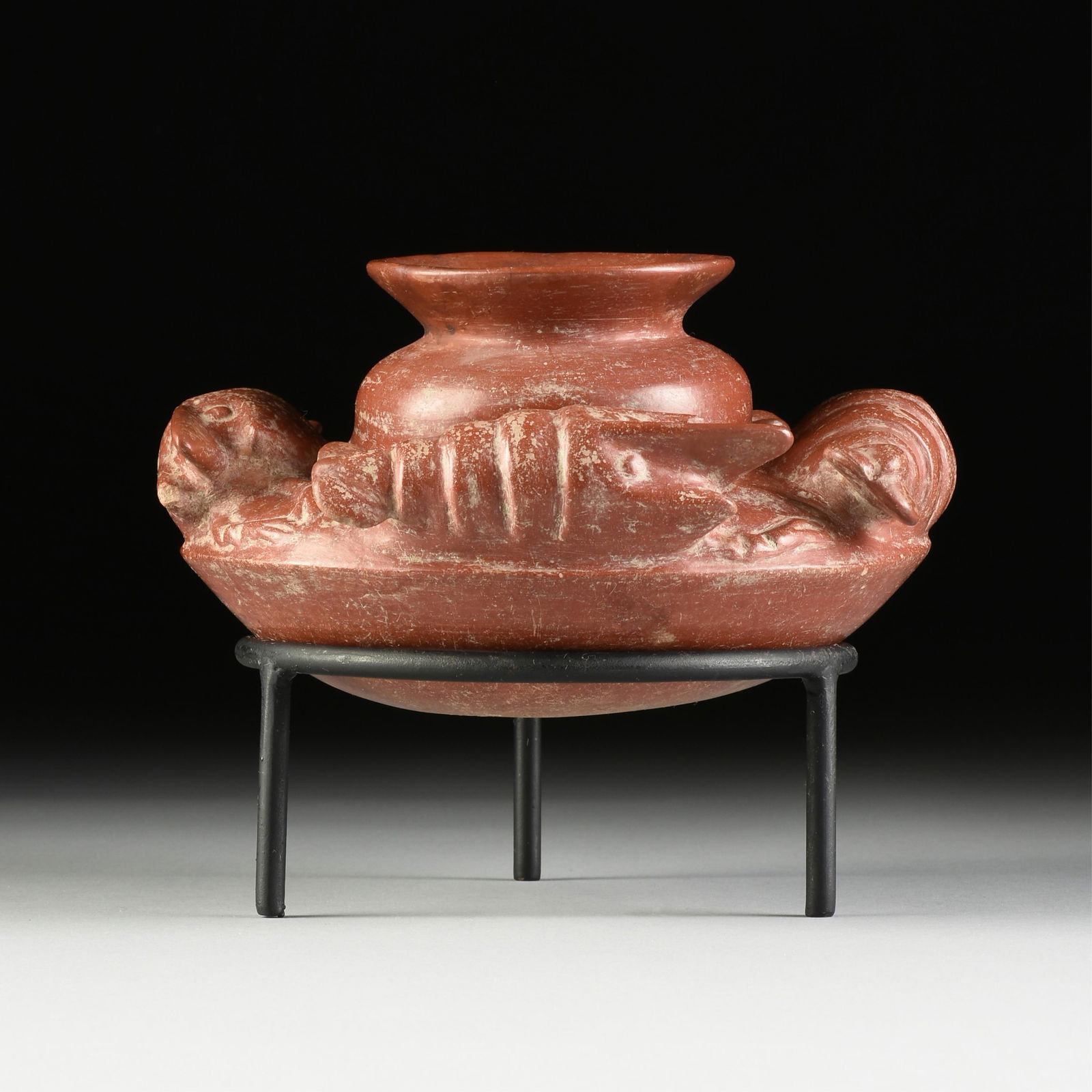 A PRE-COLUMBIAN REDWARE CRAYFISH LOBSTER EFFIGY VESSEL ON STAND, COLUMBIAN, MEXICO, 2ND CENTURY BC -: A PRE-COLUMBIAN REDWARE CRAYFISH LOBSTER EFFIGY VESSEL ON STAND, COLUMBIAN, MEXICO, 2ND CENTURY BC - AD 3RD CENTURY, the vessel with an everted conical mouth over a central ballooning jar form surroun