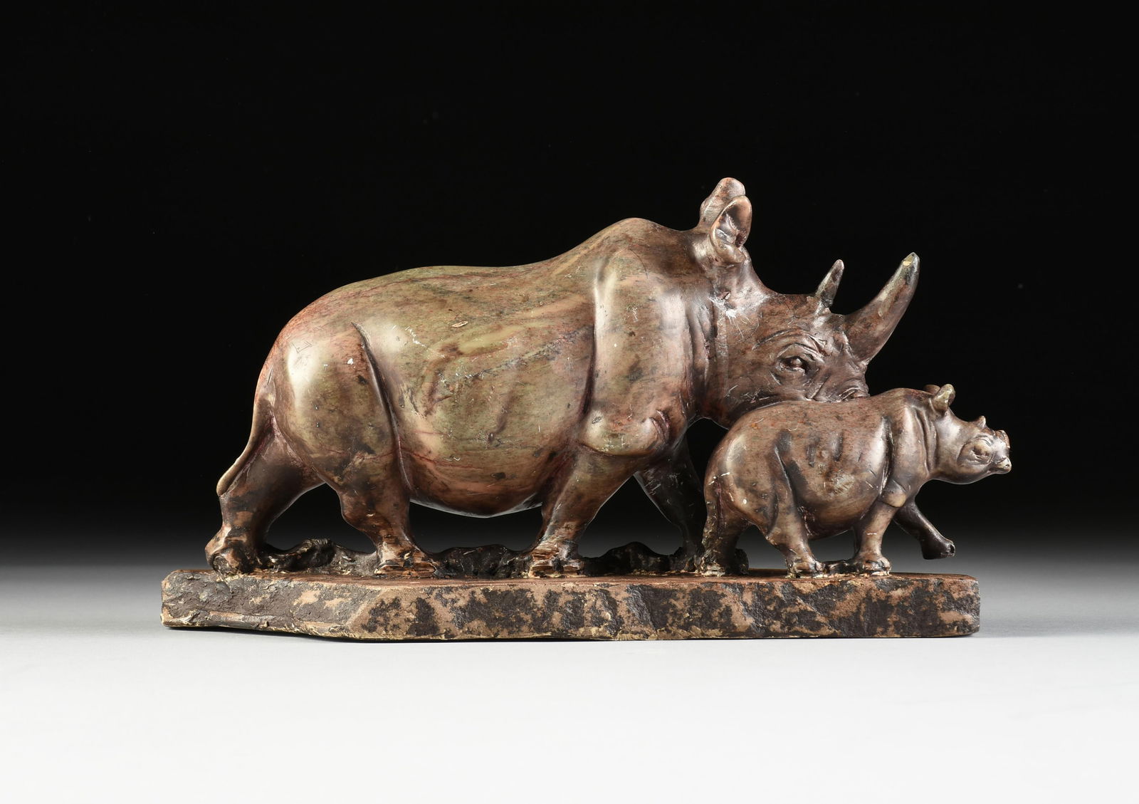 AN AFRICAN SHONA STYLE RHINOCEROS AND CALF LAPIDARY STONE SCULPTURE, MID/LATE 20TH CENTURY (1 of 8)