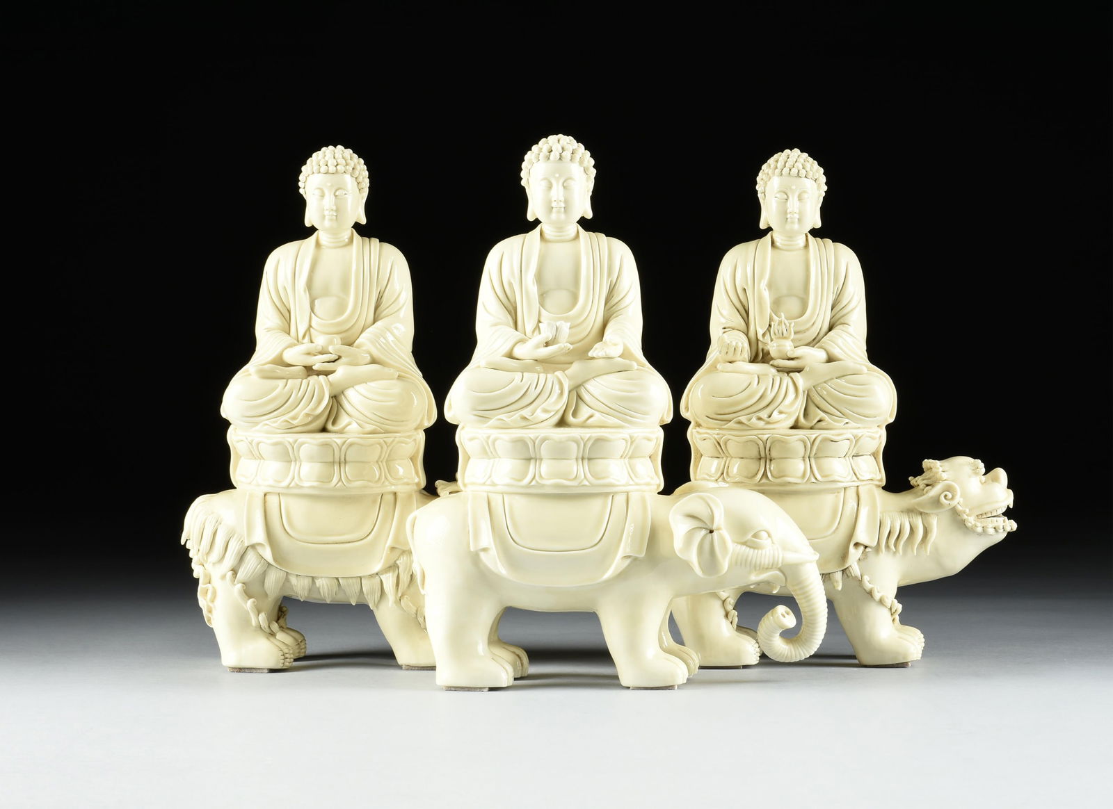 THREE PORCELAIN FIGURES OF BUDDHA, CHINESE, 21ST CENTURY, made from Dehau white porcelain and marked (1 of 11)