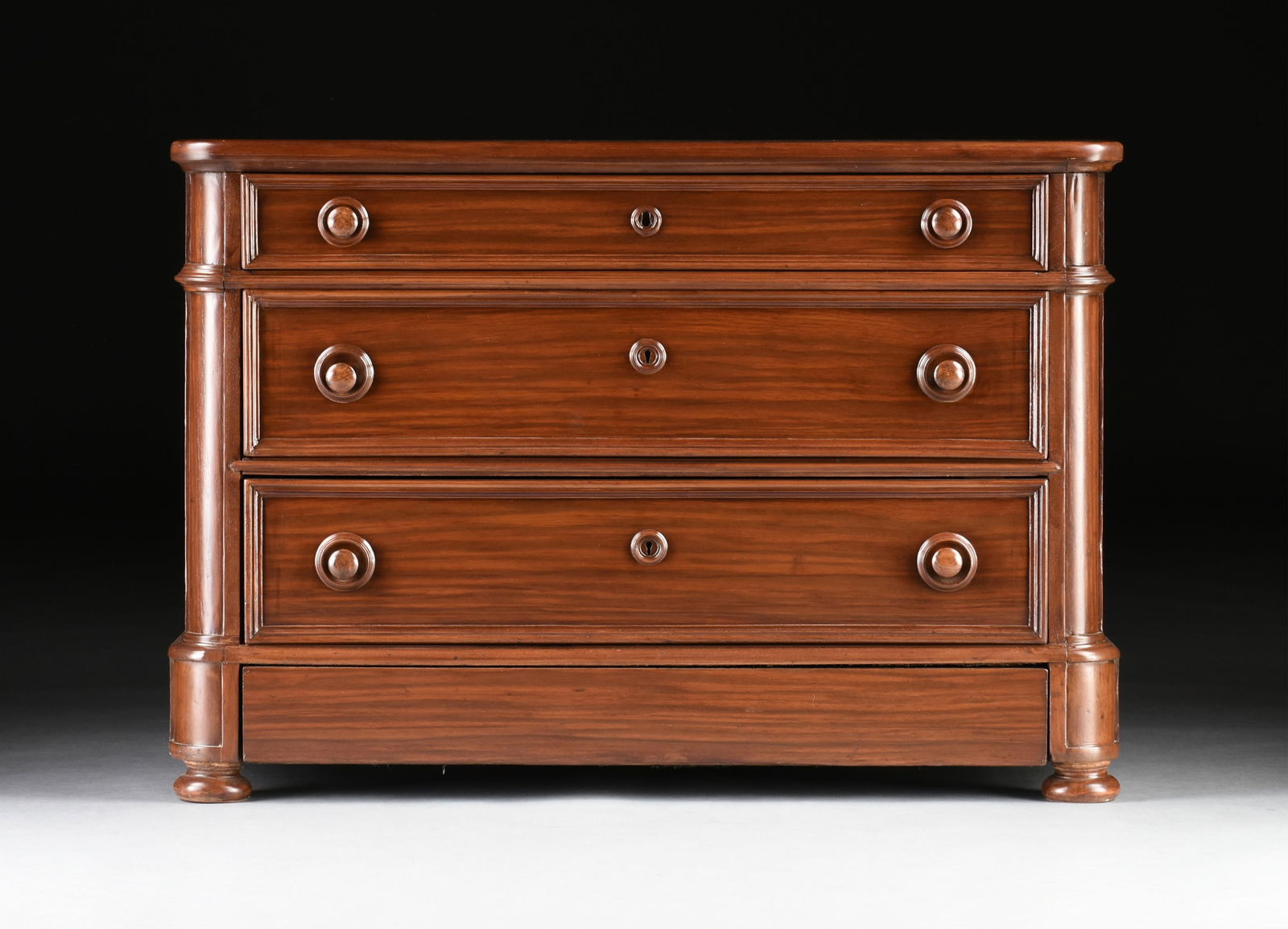 A MAHOGANY CHEST OF DRAWERS, FRENCH, 19TH CENTURY, of rectangular form with rounded corners, with (1 of 11)