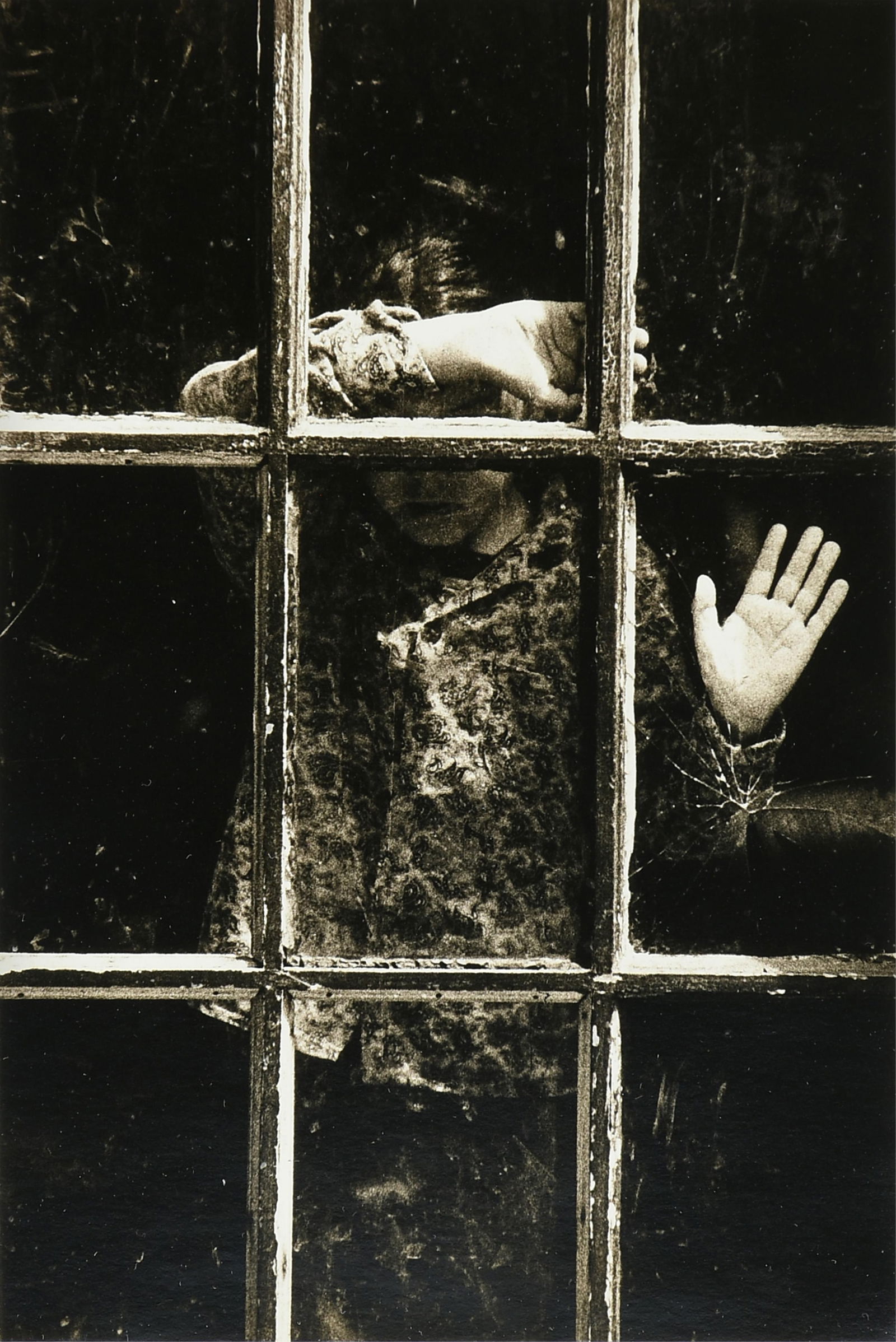 GEORGE KRAUSE (American/Texas b. 1937) "Gypsy Boy, Philadelphia," 1962, gelatin silver print, signed: GEORGE KRAUSE (American/Texas b. 1937) "Gypsy Boy, Philadelphia," 1962, gelatin silver print, signed and dated in the margin L/R, "G Krause '62." 7" x 4 3/4" Frame: 14 1/4" x 11 3/4" Provenance: Colle