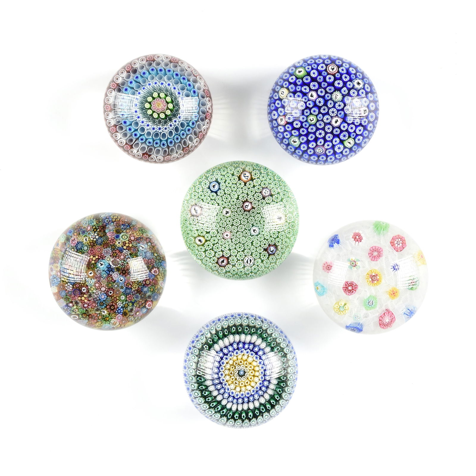 SIX BACCARAT PAPERWEIGHTS, FRENCH, 1969-1988, six crystal paperweights with astrological and floral (1 of 10)