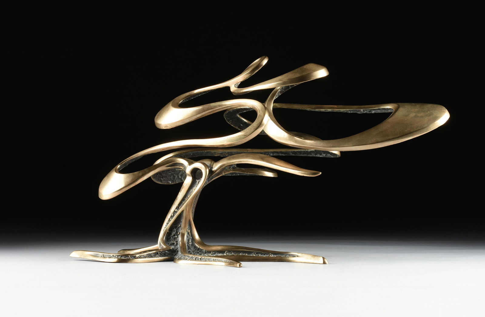 BOB BENNETT (American 1928-2003) “Carmel,” 1990, bronze with gold patina, dated, signed,: BOB BENNETT (American 1928-2003) “Carmel,” 1990, bronze with gold patina, dated, signed, and numbered at base, "'90 Bob Bennett 72/200." Height: 17" Width: 31" Depth: 12 Provenance: Collec