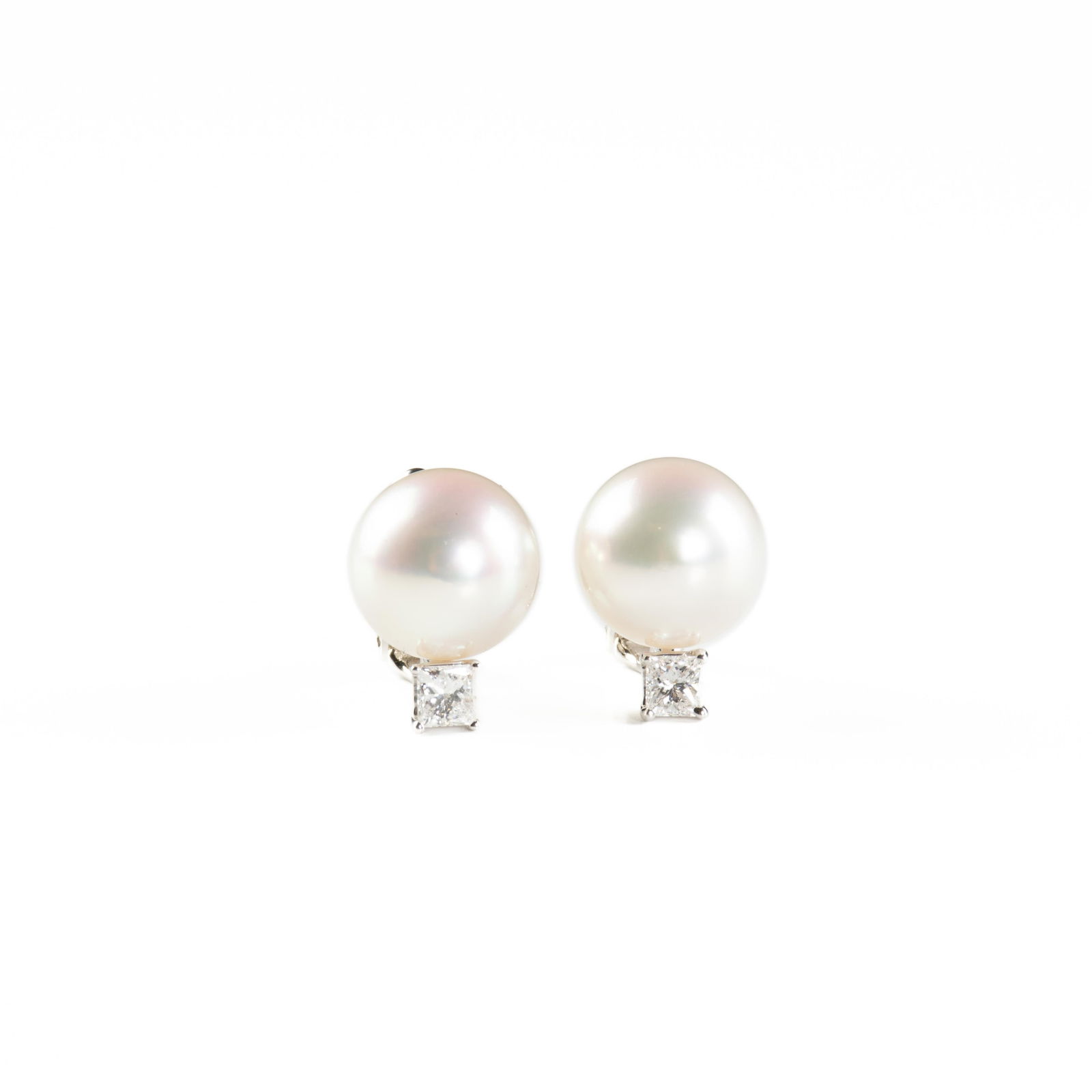 A PAIR OF 18K WHITE GOLD, PEARL, AND DIAMOND EARRINGS, a pair of 18K white gold clip back earrings (1 of 5)