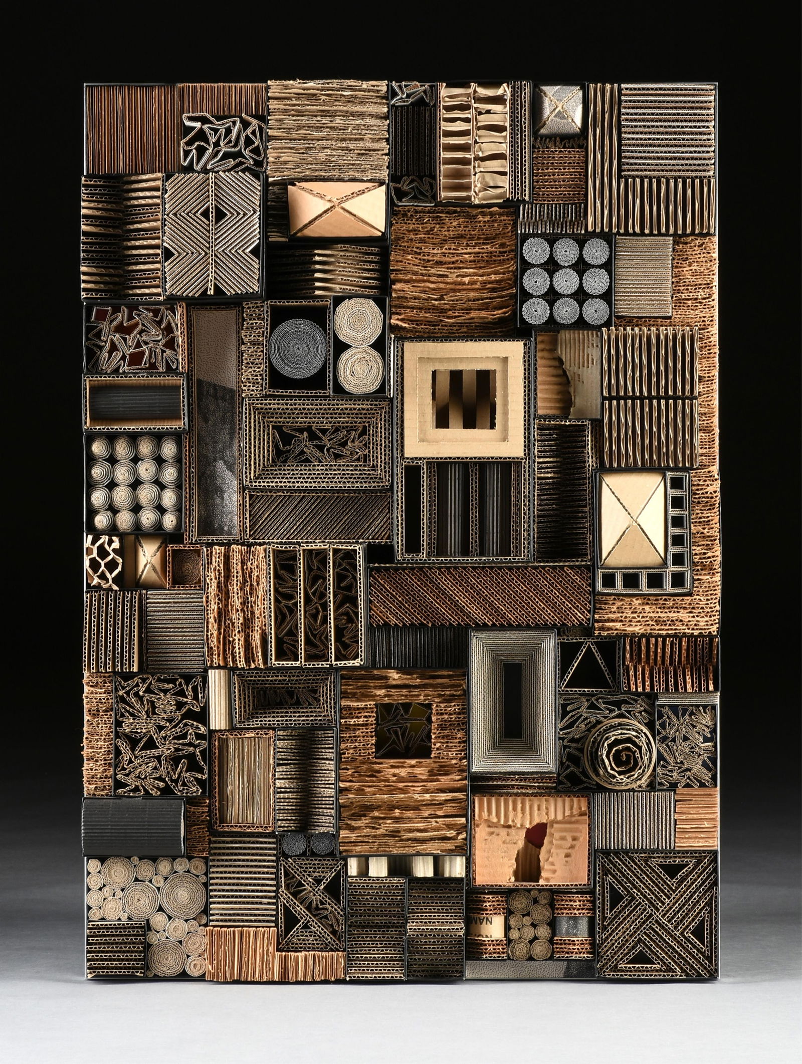 EDWARD LANE MCCARTNEY (American b. 1964) "Cartoneros #2," 2015, mixed media with cardboard, wood,: EDWARD LANE MCCARTNEY (American b. 1964) "Cartoneros #2," 2015, mixed media with cardboard, wood, aluminum, and pigment; signed, titled, and dated on reverse, "E McCartney / Cartoneros #2, 2015." 34"