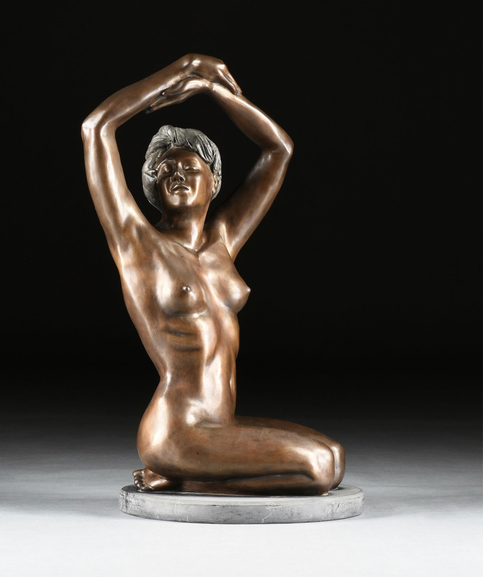 JULIAN BRAVO (Mexican) "Seated Nude with Hands above Head (Untitled)," LATE 20TH CENTURY,: JULIAN BRAVO (Mexican) "Seated Nude with Hands above Head (Untitled)," LATE 20TH CENTURY, bronze sculpture on a shaped stone base, signed indistinctly on foot and marked, "1/10." 35 x 15 x 20 in. (88.
