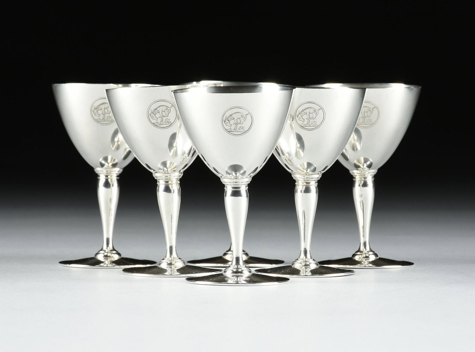 SIX TIFFANY & CO. STERLING SILVER WINE GOBLETS, AMERICAN, EARLY 20TH CENTURY,: SIX TIFFANY & CO. STERLING SILVER WINE GOBLETS, AMERICAN, EARLY 20TH CENTURY, petite sterling silver wine goblets, each engraved with an image of a bucking horse marked with the number 95 inside a 5/8