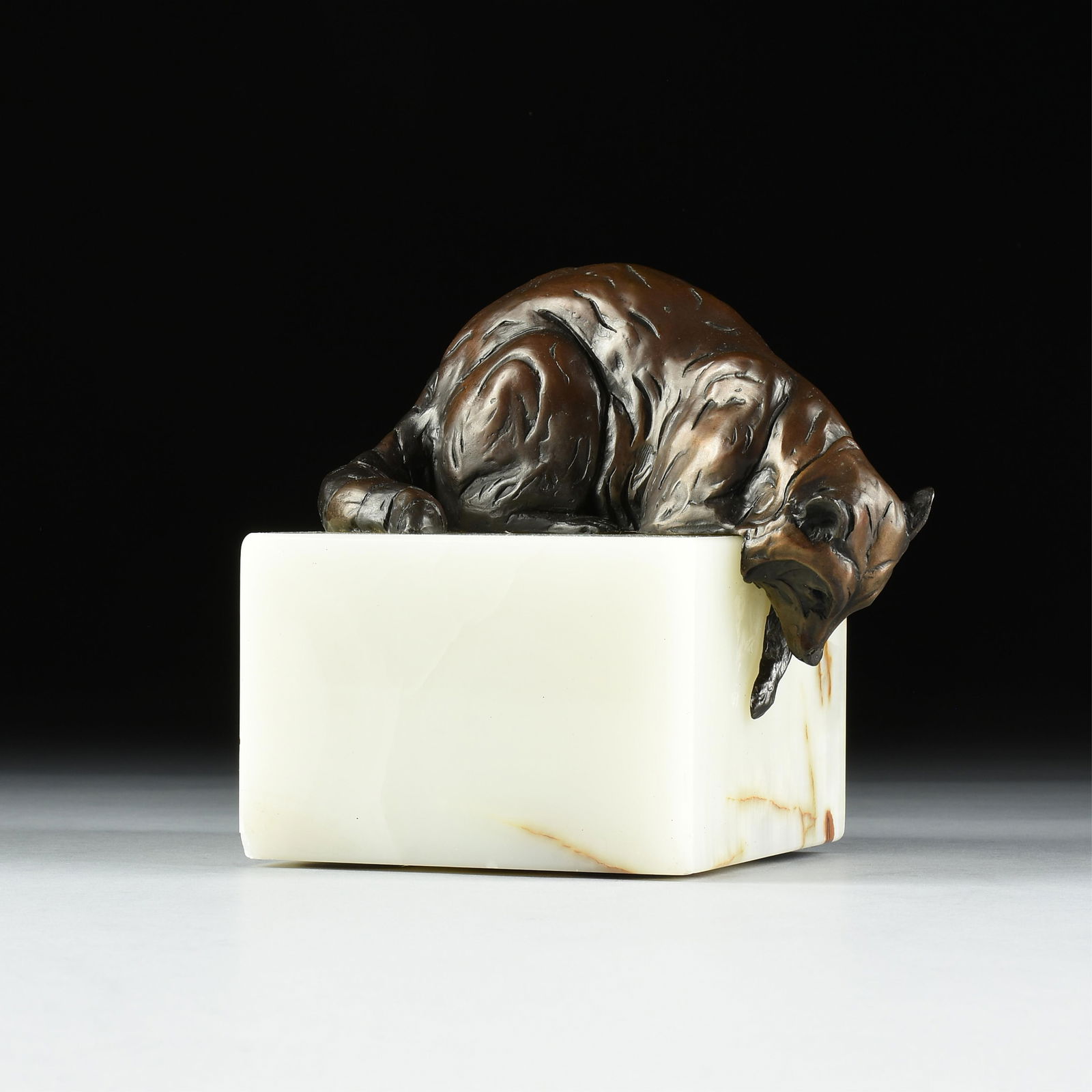 DAN OSTERMILLER (American b. 1956) "Raccoon," 1981,: DAN OSTERMILLER (American b. 1956) "Raccoon," 1981, bronze sculpture of a raccoon on a marble base, signed, dated, and numbered near tail, "Dan Ostermiller © 1981 7/20." 7 1/2 x 8 x 6 in. (19.1 x