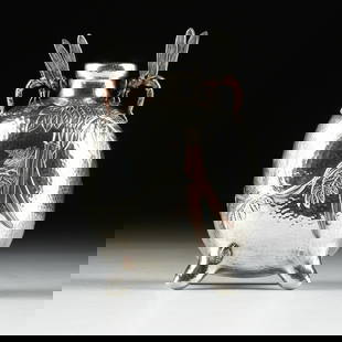 A TIFFANY & CO. STERLING SILVER DRAGONFLY VASE, AMERICAN, CIRCA 1878,: A TIFFANY & CO. STERLING SILVER DRAGONFLY VASE, AMERICAN, CIRCA 1878, a martelé sterling silver pilgrim bottle shaped vase with mixed metal ornament, including trumpet vines and dragonfly handles, ma
