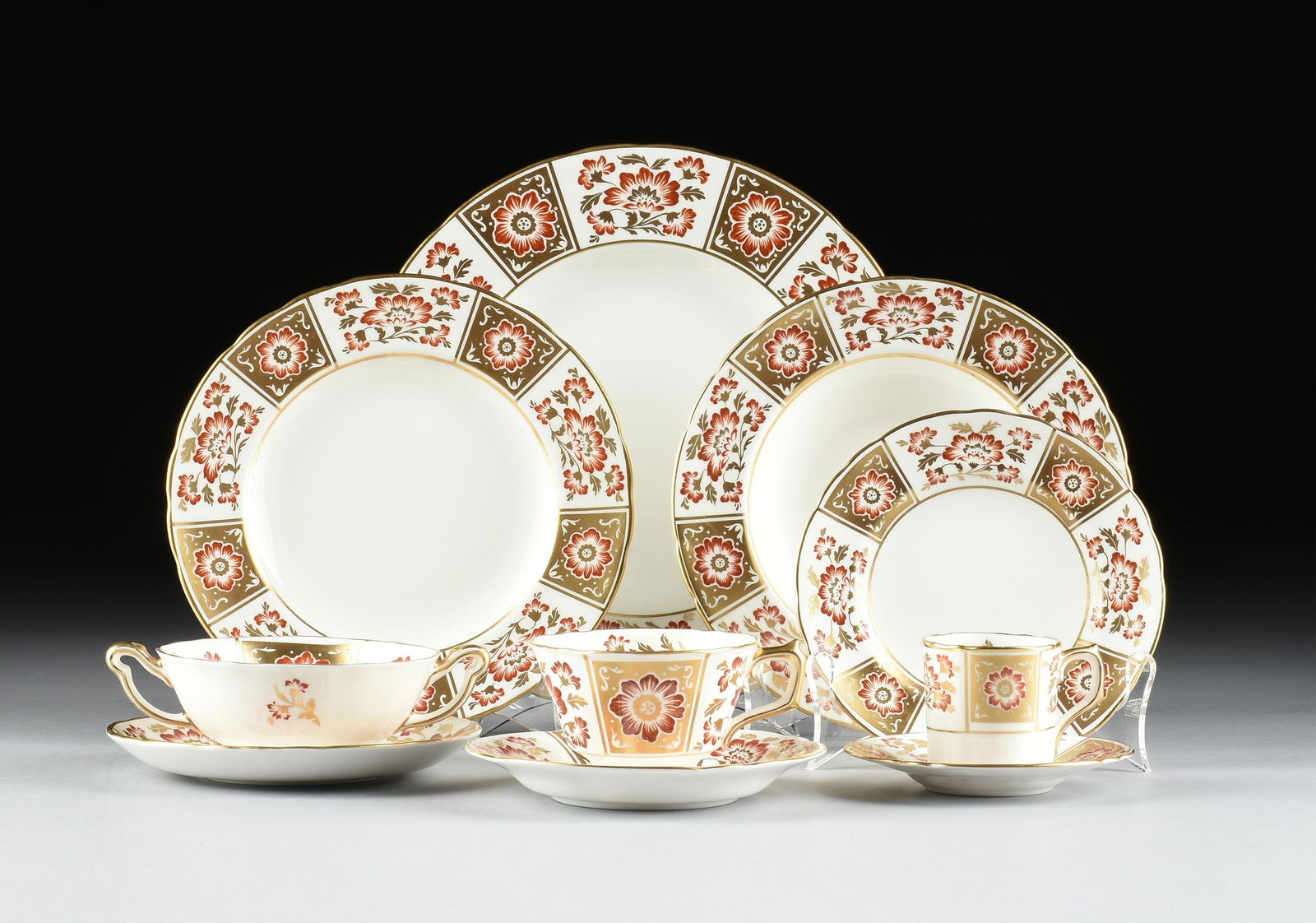A ROYAL CROWN DERBY 127 PIECE "Red Derby Panel" DINNER SERVICE, ENGLISH, 1966,: A ROYAL CROWN DERBY 127 PIECE "Red Derby Panel" DINNER SERVICE, ENGLISH, 1966, a porcelain dinner service for twelve with six piece place settings, including dinner plates, salad plates, bread and but