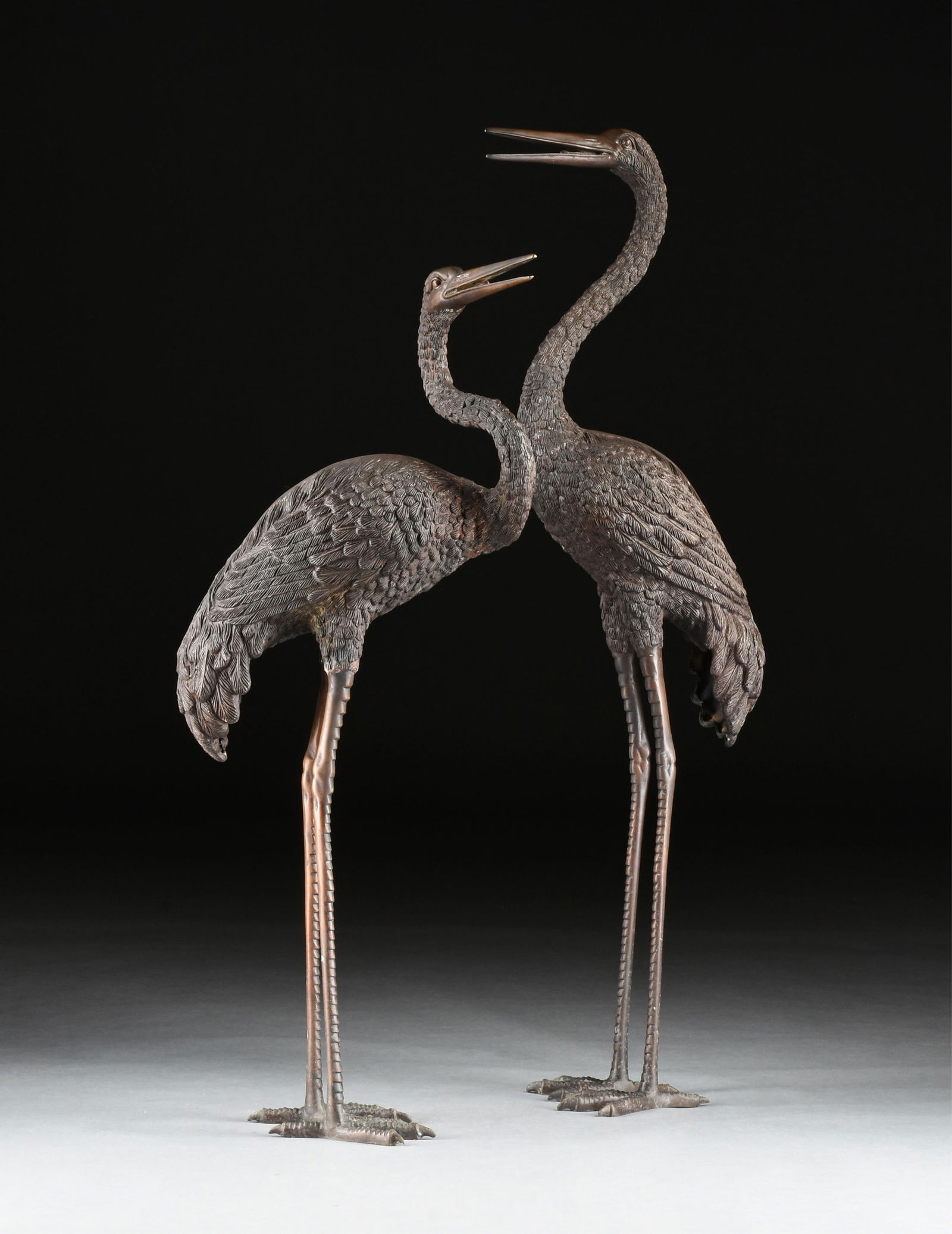 A LARGE PAIR OF MEIJI STYLE BRONZE CRANES, PROBABLY JAPANESE, 20TH CENTURY, (1 of 18)