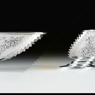 A SILVER PRESENTATION BOWL, CHINESE, 19TH/20TH CENTURY,: A SILVER PRESENTATION BOWL, CHINESE, 19TH/20TH CENTURY, a Chinese export silver bowl with floral designs on three sides, marked with the retailer's initials, "SF," (Sing Fat), a Chinese ideogram, and