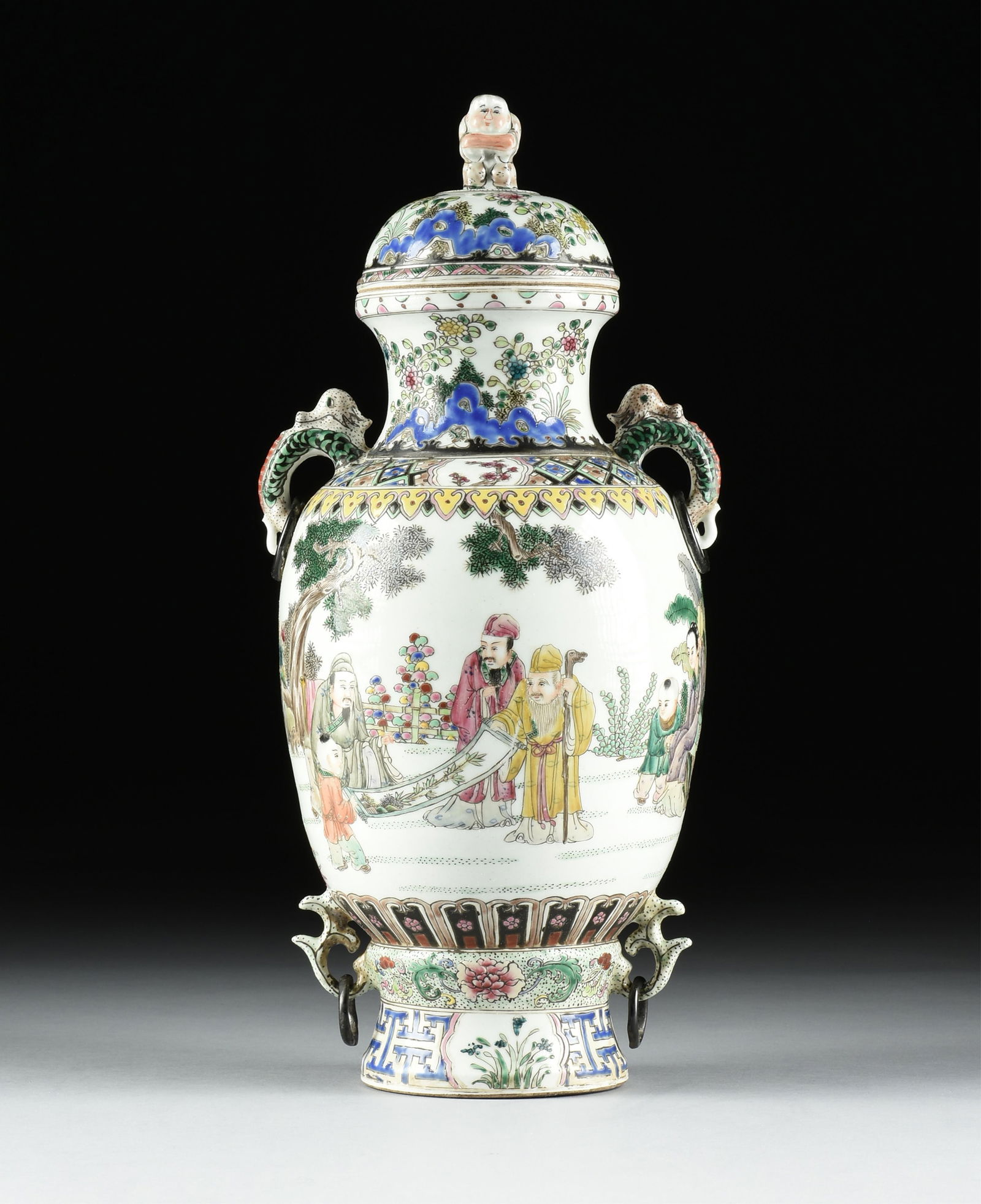 A FAMILLE ROSE STYLE PORCELAIN URN, CHINESE, 20TH CENTURY,: A FAMILLE ROSE STYLE PORCELAIN URN, CHINESE, 20TH CENTURY, hand painted porcelain urn with lid, marked with an aspirational Qianlong seal on base. 18 1/2 in. (47 cm.) Provenance: Collection of Richard