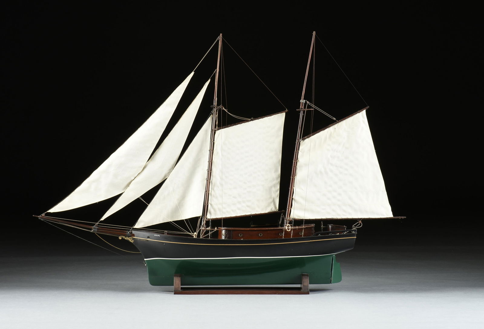 A LARGE MODEL TALL SHIP, "Hope," 20TH CENTURY,: A LARGE MODEL TALL SHIP, "Hope," 20TH CENTURY, wooden model ship with fabric sails and moving parts. 33 x 48 x 8 in. (83.8 x 121.9 x 20.3 cm.) Provenance: Private Collection, Houston, Texas.