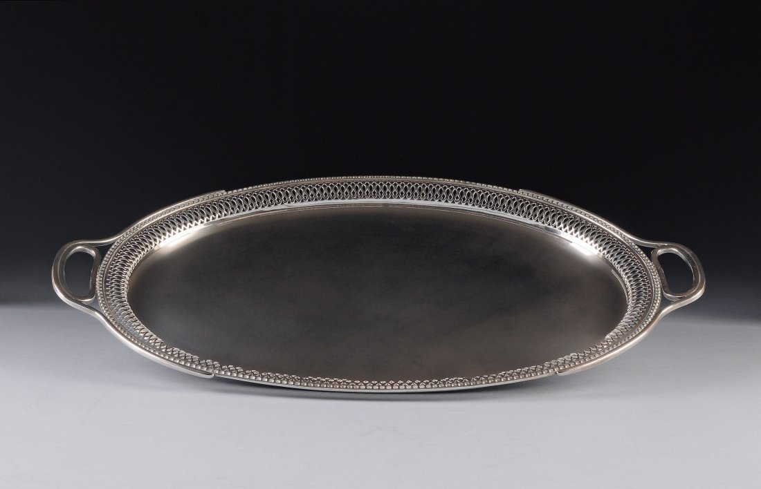 A BUCCELLATI STERLING SILVER TRAY, ITALIAN, 20TH: A BUCCELLATI STERLING SILVER TRAY, ITALIAN, 20TH CENTURY the shallow tray of oval form with reticulated and everted gallery encircled with beading to edges, reinforced handles, stamped with maker's ma