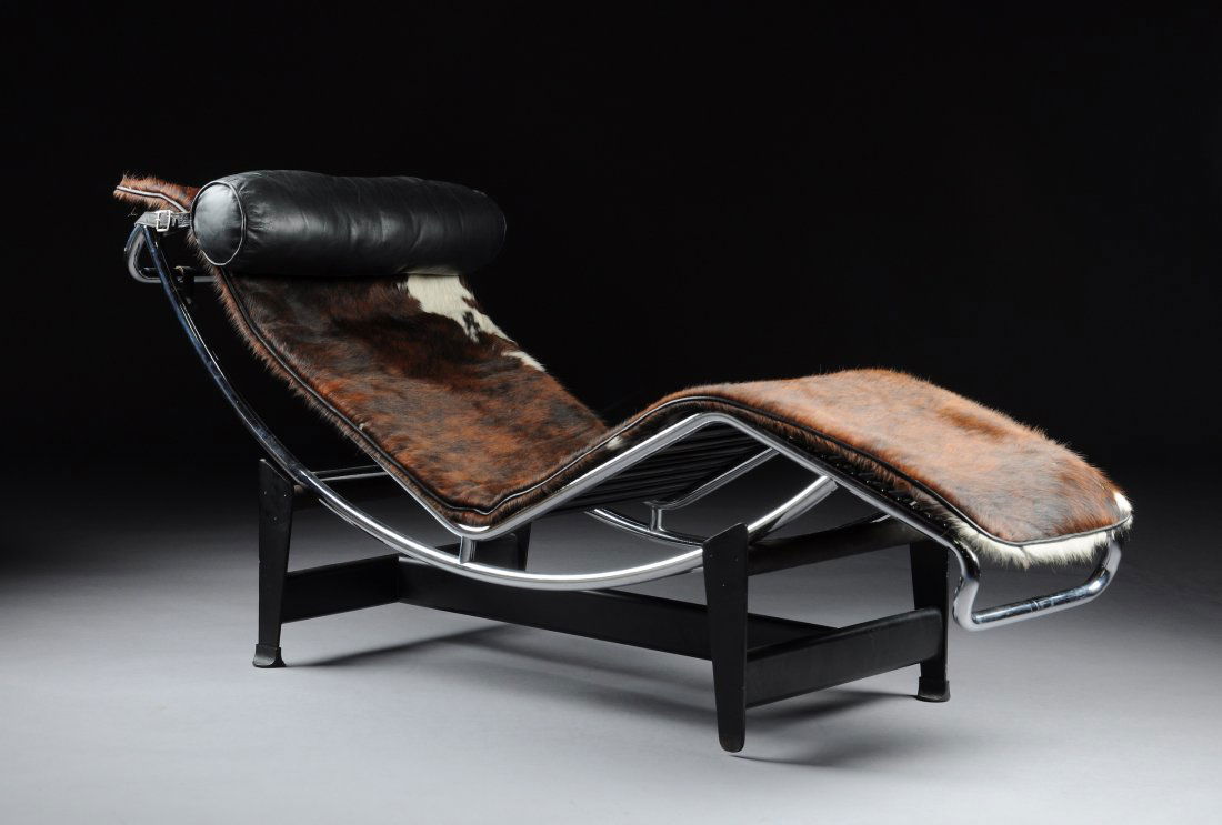 A CONTEMPORARY LE CORBUSIER STYLE CHAISE LONGUE,: A CONTEMPORARY LE CORBUSIER STYLE CHAISE LONGUE, BY CASSINA, LAST-QUARTER 20TH CENTURY, the contoured rectangular tubular chrome frame enclosing rubber wrapped spring straps centering a conforming pad