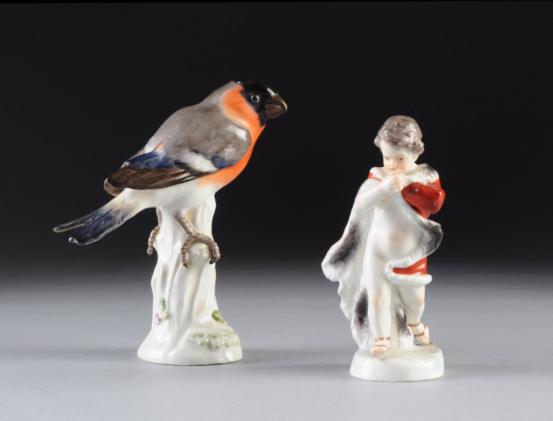 TWO MEISSEN POLYCHROME ENAMELED FIGURES, BLUE CRO: TWO MEISSEN POLYCHROME ENAMELED FIGURES, BLUE CROSSED SWORDS MARK, INCISED A.71. AND 899. PRESSENUMMERS 52 AND 149V, 19TH/20TH CENTURY, one modeled as a a putto emblematic of winter and wearing a fur