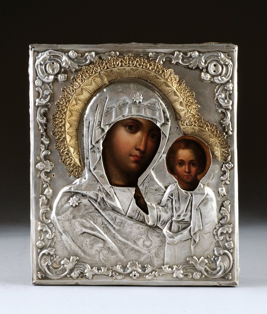 A RUSSIAN ICON OF THE MOTHER OF GOD OF KAZAN, FUN: A RUSSIAN ICON OF THE MOTHER OF GOD OF KAZAN, FUNTIKOV MAXIM EUDOKIMOVICH, MOSCOW, 1850, egg tempera on board with silver riza. 12 1/2" x 10 3/8". Postnikova-Loseva #2693.