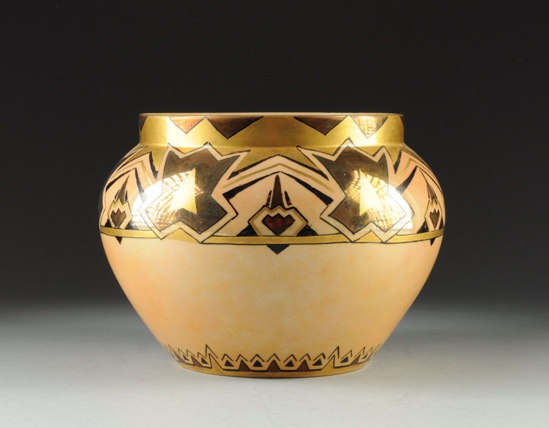 AN ART DECO LUSTER WARE PORCELAIN JARDINIÈRE by Bernard: AN ART DECO LUSTER WARE PORCELAIN JARDINIÈRE by Bernardaud & Company, Limoges, France, the tapered bulbous sides surmounted by a short neck decorated with a broad band of geometric panels alternating