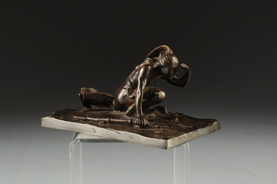 after CARL KAUBA (Austrian/American 1865-1922) A BRONZE: after CARL KAUBA (Austrian/American 1865-1922) A BRONZE SCULPTURE, "Indian Scout," signed. Stamped 4295/30, Austria. Height: 2 3/8" Width: 4 1/4" Depth: 2 1/2"