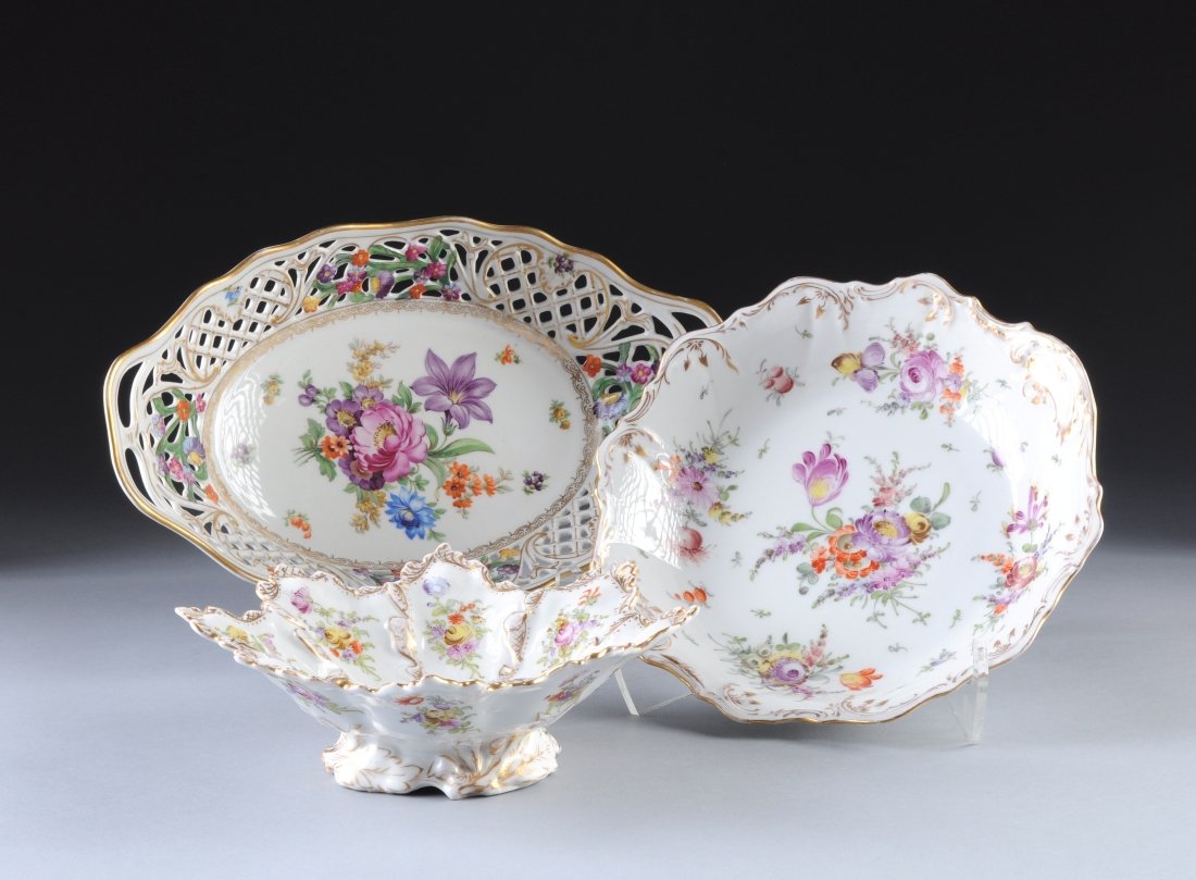 THREE DRESDEN FLORAL DECORATED PORCELAIN DISHES, LATE 1: THREE DRESDEN FLORAL DECORATED PORCELAIN DISHES, LATE 19TH/EARLY 20TH CENTURY, comprised of a Schumann Bavarian pierced lattice work oval bowl decorated with floral sprays to center and edges with gil