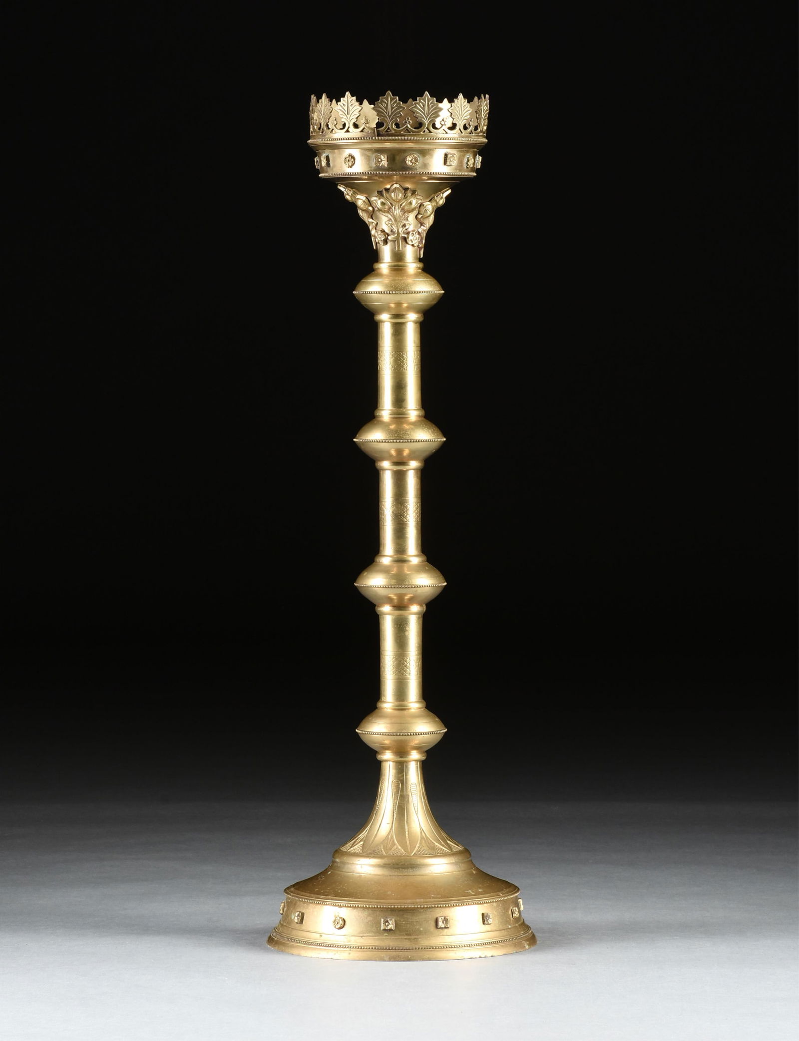 A LARGE BRASS GOTHIC REVIVAL CANDLESTICK, CIRCA 1900, (1 of 7)