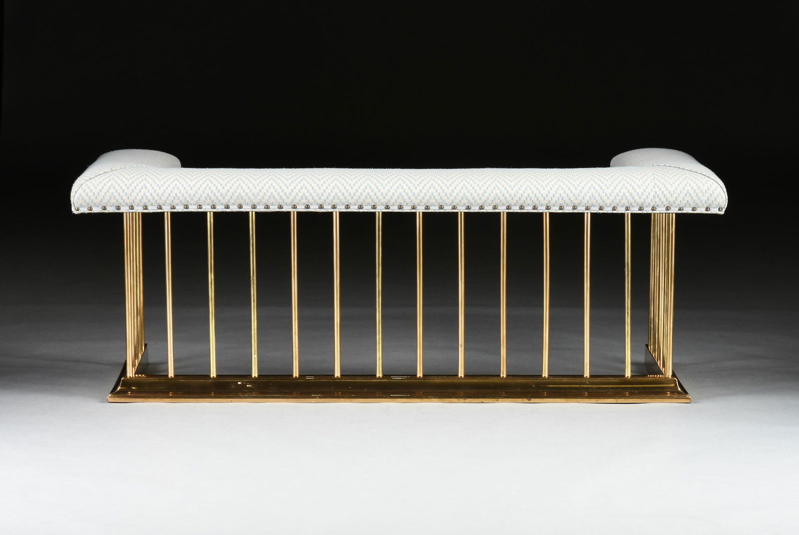 AN UPHOLSTERED FIREPLACE FENDER, EUROPEAN, 20TH CENTURY (1 of 3)