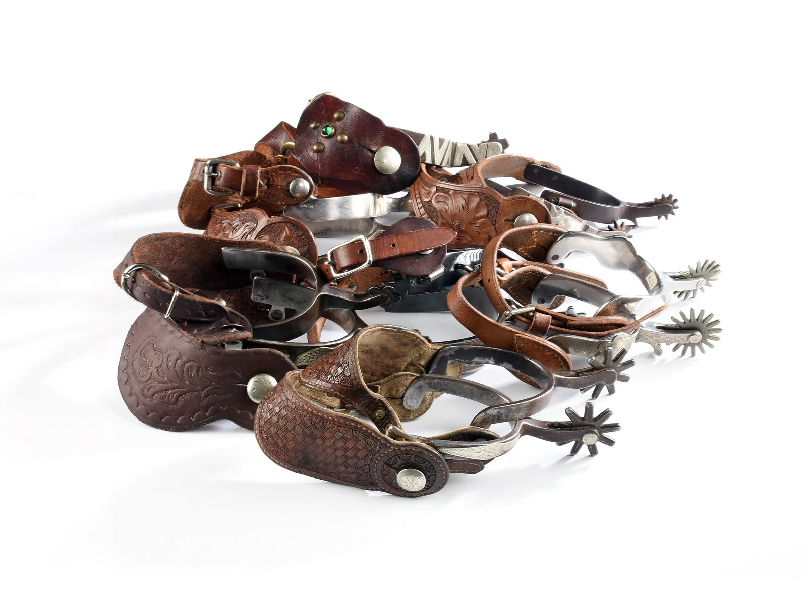 SEVEN PAIRS OF CROCKETT SPURS, AMERICAN, 1930s - 1980s, (1 of 15)