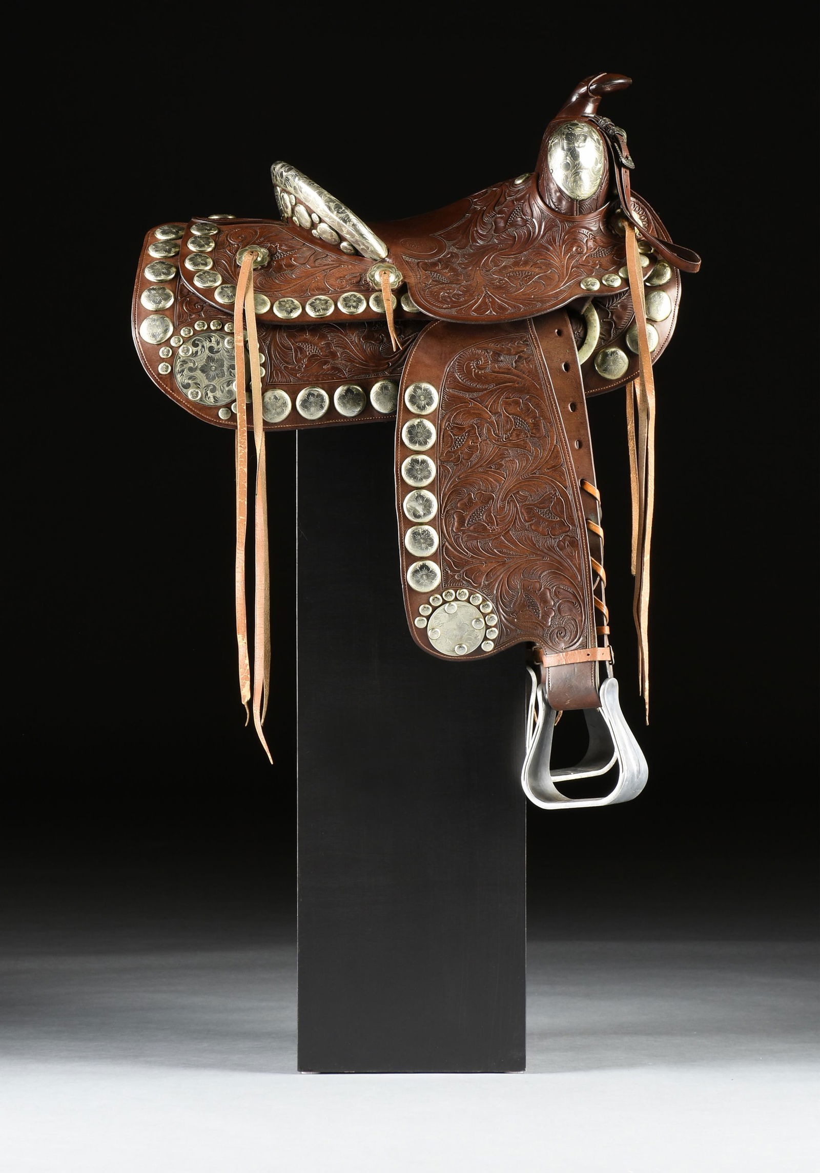 A WESTERN SADDLE MFG. CO. SADDLE and BRIDLE, AMERICAN, MID 20TH CENTURY, (1 of 20)