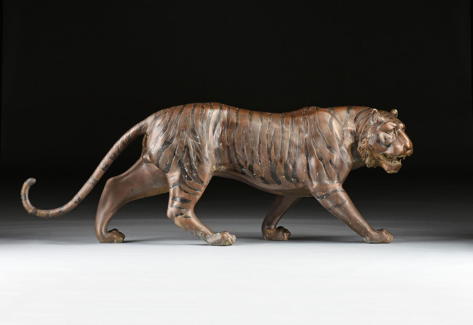 A LARGE BRONZE TIGER, 20TH CENTURY, (1 of 9)