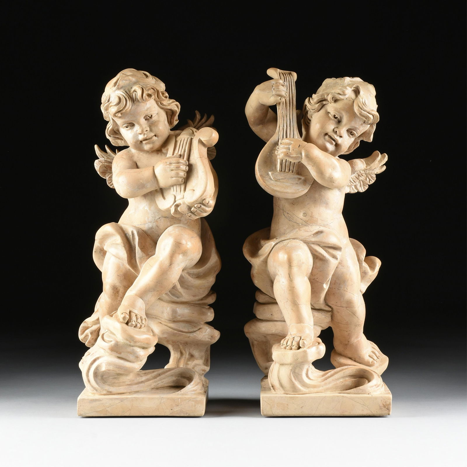A PAIR OF MARBLE PUTTI WITH INSTRUMENTS, 20TH CENTURY, (1 of 9)