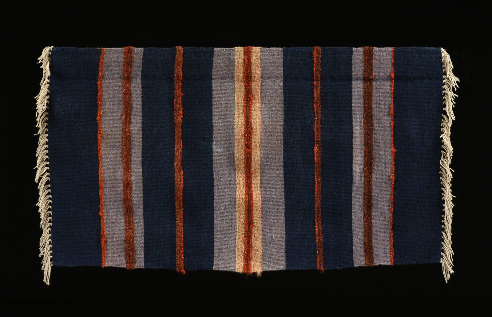 NOEL DILLEEN (American) "Blue and Red Stripe (Untitled)," CIRCA 1970,: NOEL DILLEEN (American) "Blue and Red Stripe (Untitled)," CIRCA 1970,hand woven wool wall hanging.38 x 67 1/2 in. (96.5 x 171.5 cm.)