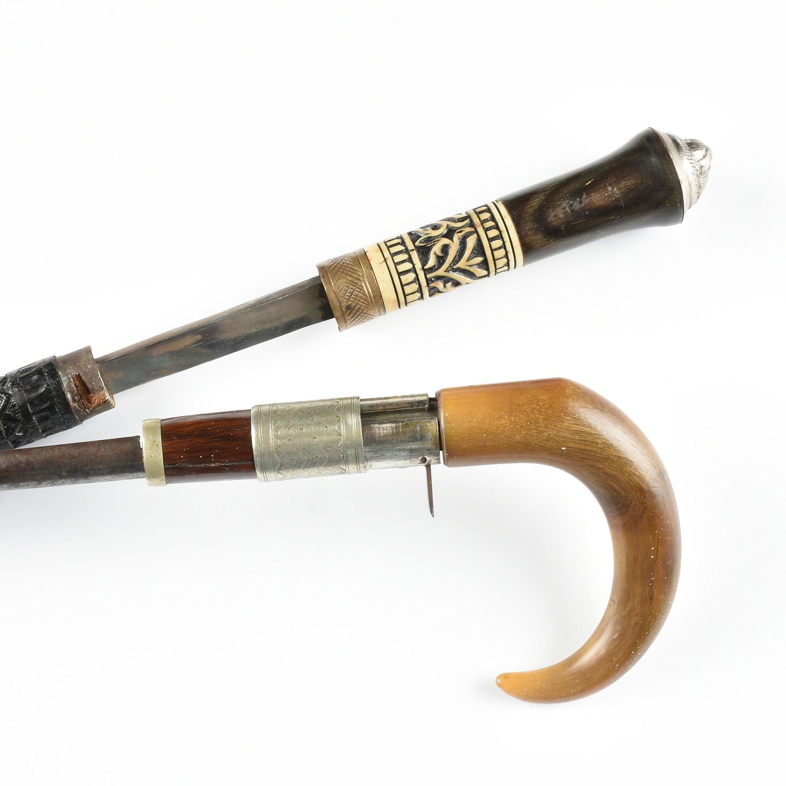 A CANE GUN AND A SWORD CANE, 19TH/20TH CENTURY, (1 of 8)
