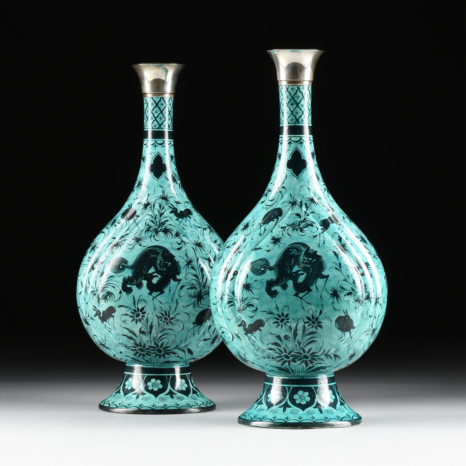 A PAIR OF SAMSON ET CIE SAFAVID STYLE VASES, FRENCH, LATE 19TH CENTURY,: A PAIR OF SAMSON ET CIE SAFAVID STYLE VASES, FRENCH, LATE 19TH CENTURY,two ceramic vases with silver mounts, marked underneath "FRANCE," and with French assay marks on the lower rim of the silver moun
