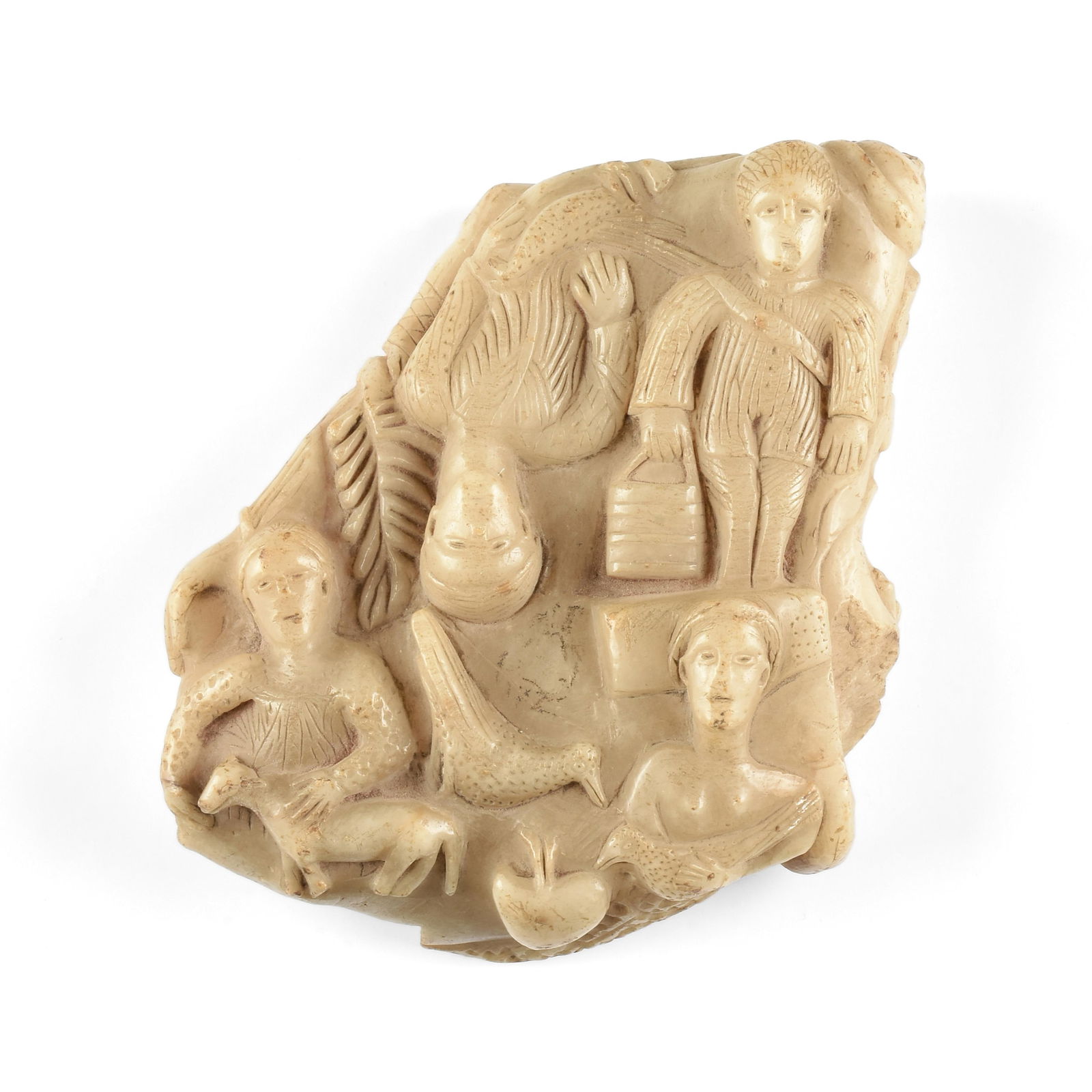 A MEDIEVAL ALABASTER RELIEF CARVING WITH FIGURES AND ANIMALS, IRISH, 10TH - 11TH CENTURY,: A MEDIEVAL ALABASTER RELIEF CARVING WITH FIGURES AND ANIMALS, IRISH, 10TH - 11TH CENTURY,hand carved alabaster with three human figures, a mermaid, a cow, and three birds.2 1/4 x 7 1/2 x 6 in. (5.7 x