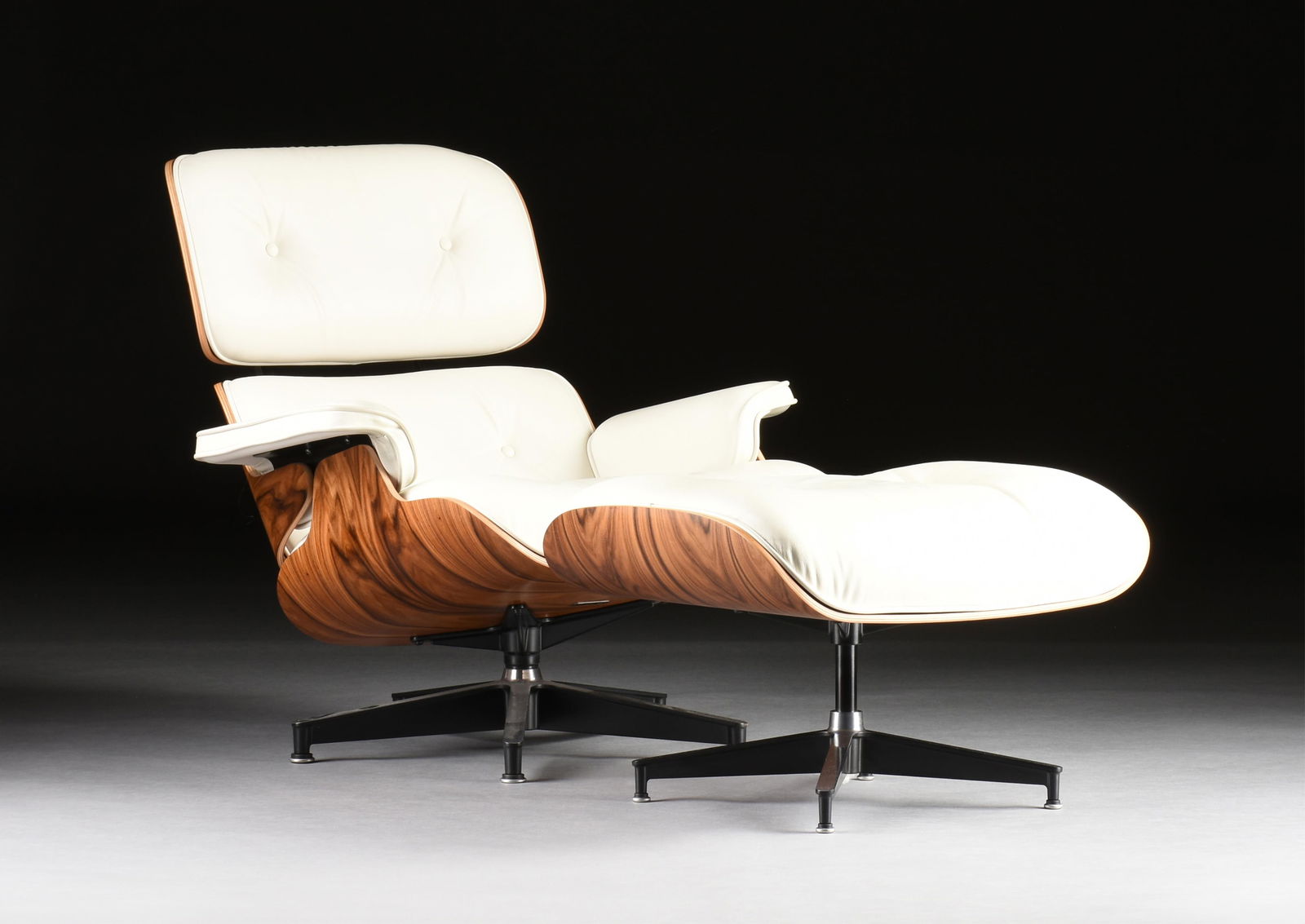 CHARLES AND RAY EAMES (American 1907-1978 / 1912-1988) A HERMAN MILLER EAMES LOUNGE CHAIR 670 AND (1 of 9)