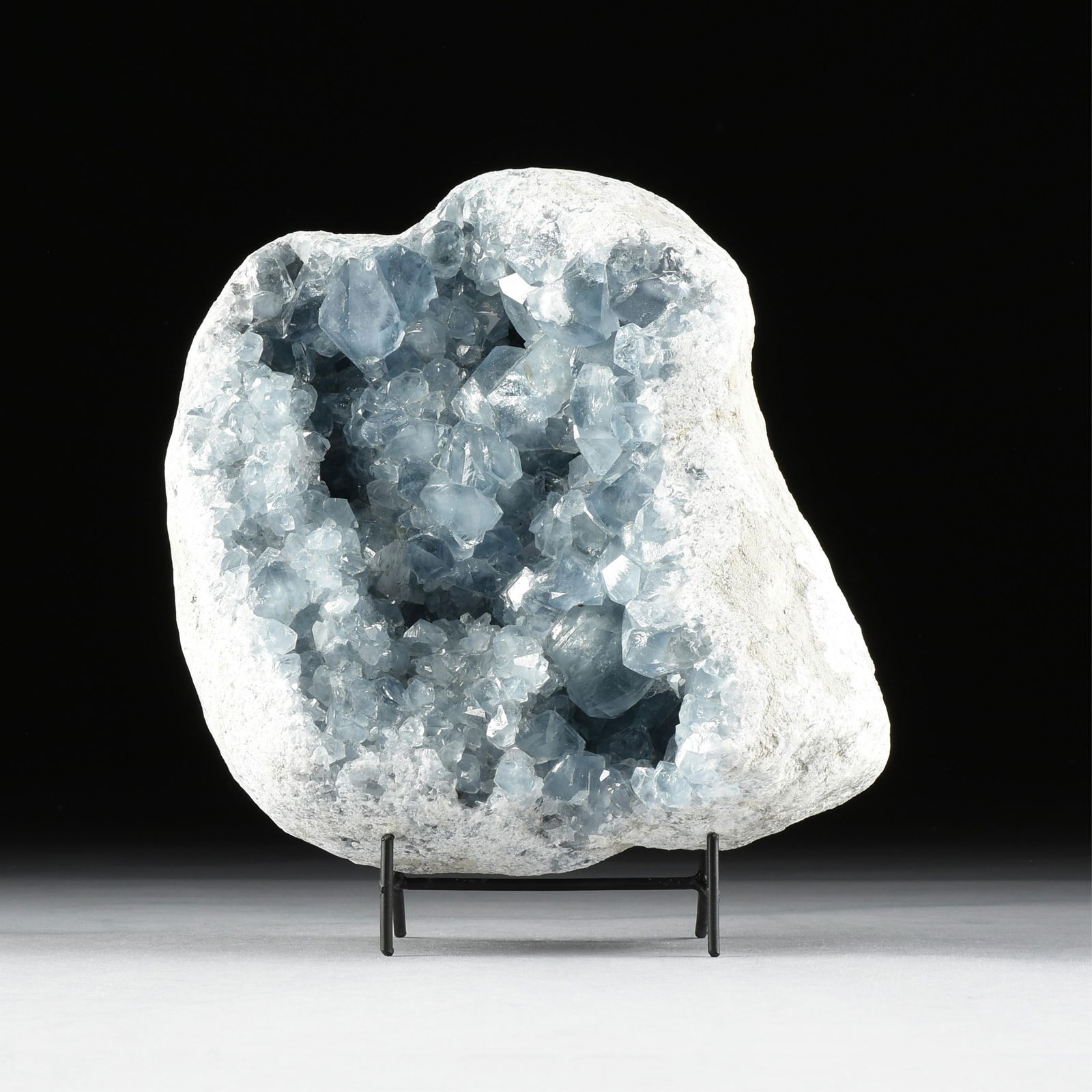 A CELESTIE GEODE SPECIMEN, MADAGASCAR,: A CELESTIE GEODE SPECIMEN, MADAGASCAR,a polished celestie geode. Total approximate weight: 34.8 lbs.10 x 10 3/4 x 5 3/4 in. (25.4 x 27.3 x 14.6 cm.)