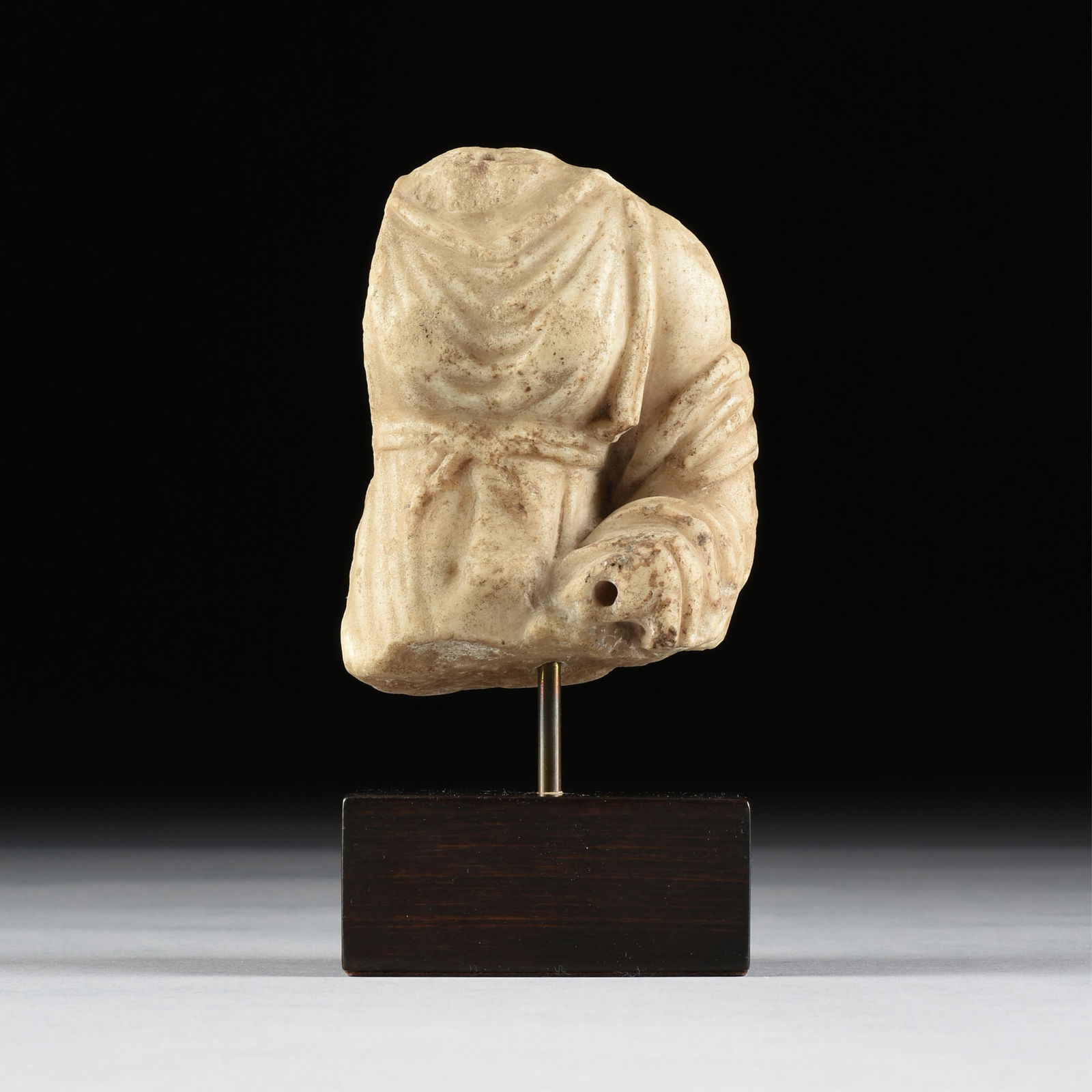 A ROMAN IMPERIAL MARBLE TORSO OF A WOMAN WEARING A PEPLOS, 1ST - 3RD CENTURY, (1 of 4)