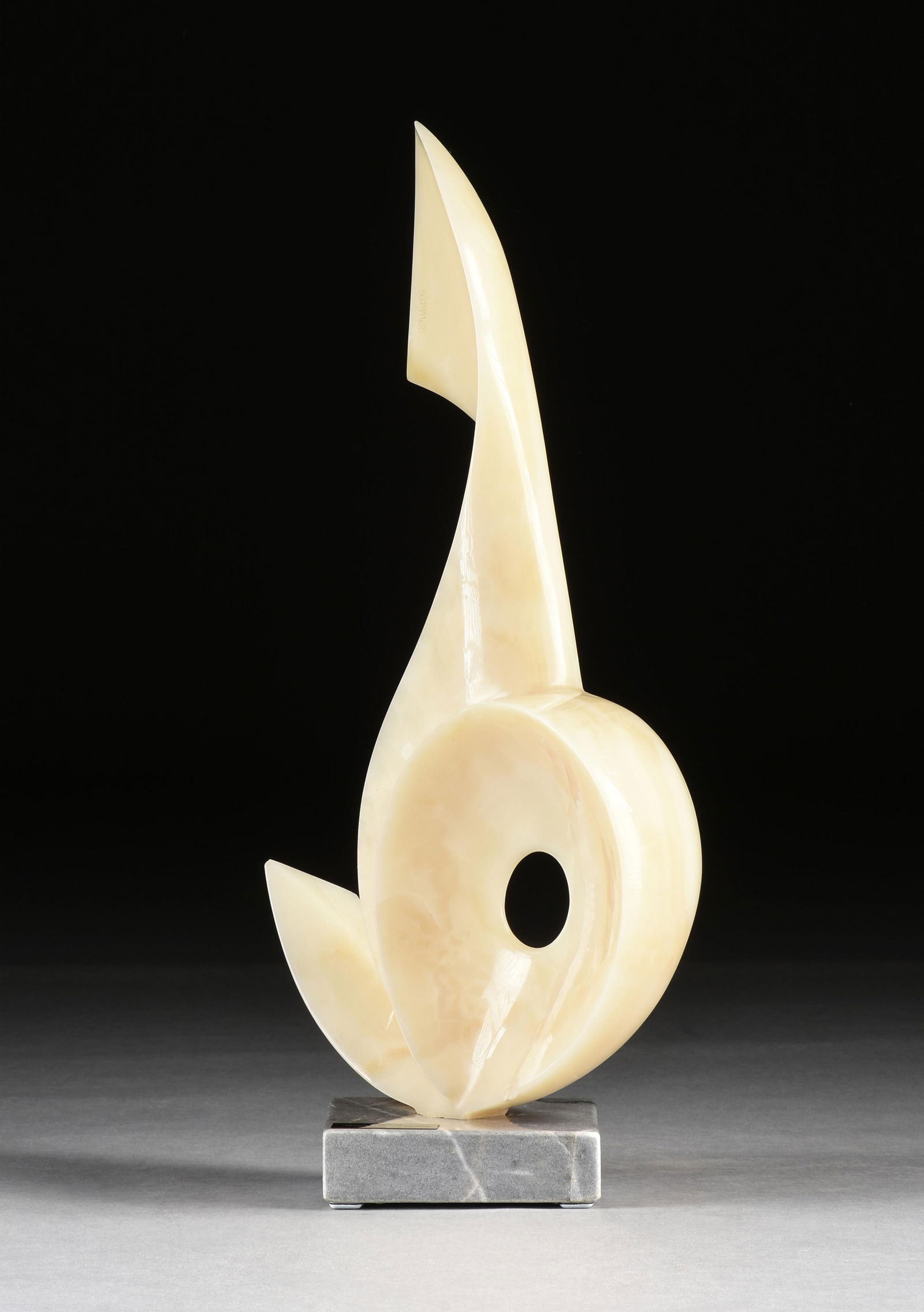 LEONARDO NIERMAN (Mexican 1932-2023) "Harmony," 1977,: LEONARDO NIERMAN (Mexican 1932-2023) "Harmony," 1977,white onyx on a gray marble base, signed at top, "Nierman."31 x 13 x 13 in. (78.7 x 33 x 33 cm.) Provenance: Collection of Homero Anchondo, Katy, T