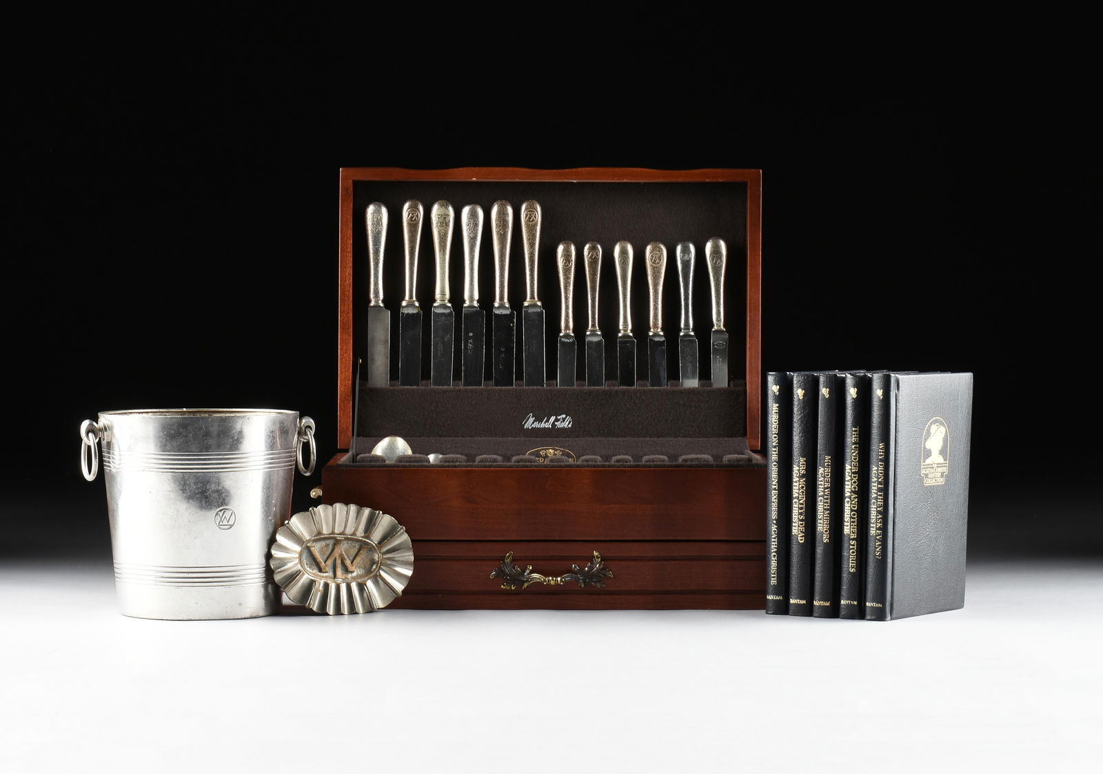 AN ORIENT EXPRESS COLLECTION, 20TH CENTURY,: AN ORIENT EXPRESS COLLECTION, 20TH CENTURY,including a silver plated ice bucket with Orient Express monogram, a silver plated ash tray with monogram, a set of monogrammed silver plated flatware includ