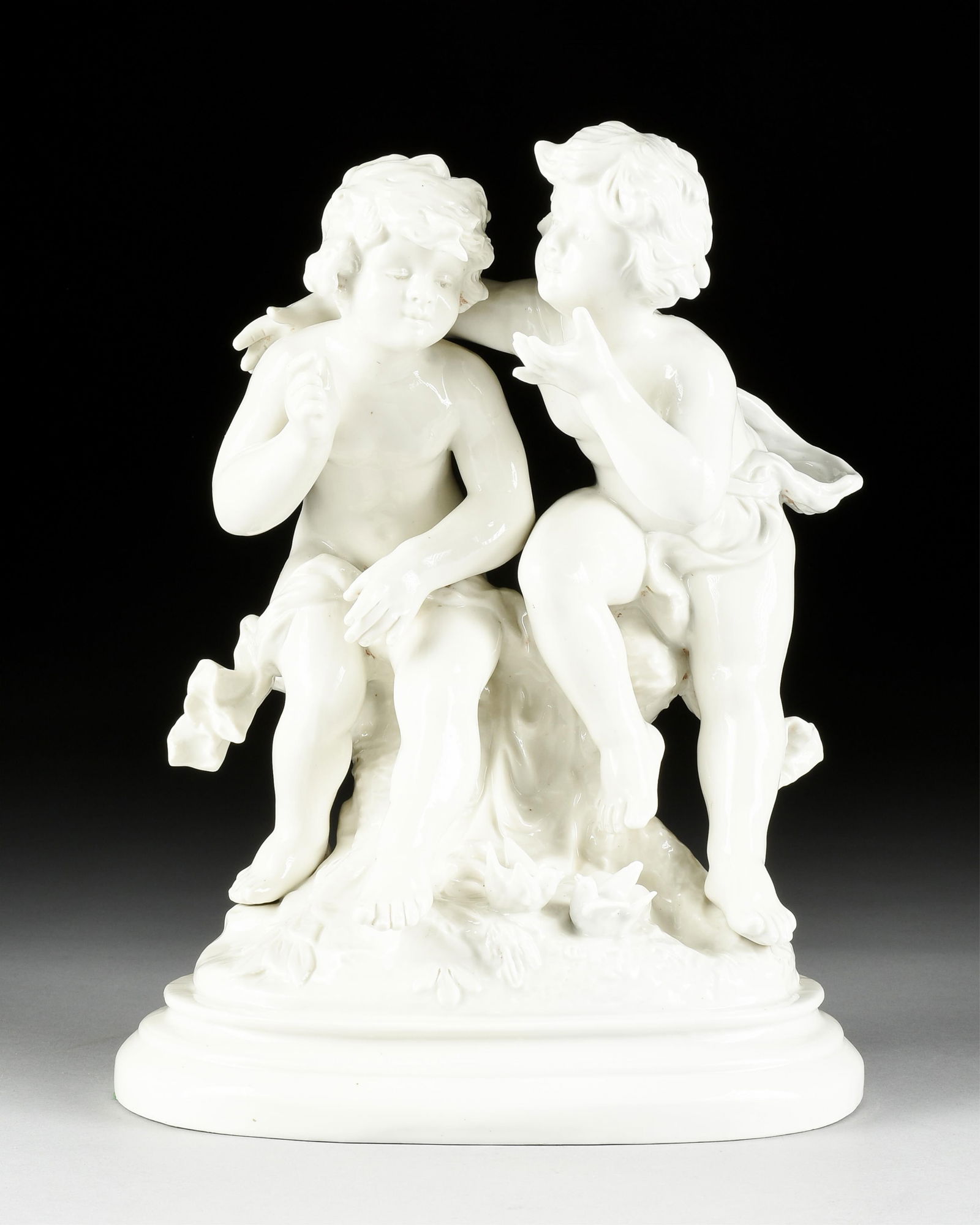FRANCOIS NICOLAS KESSLER (French 1792-1882) A CAPODIMONTE PORCELAIN SCULPTURE OF TWO PUTTI, ITALIAN,: FRANCOIS NICOLAS KESSLER (French 1792-1882) A CAPODIMONTE PORCELAIN SCULPTURE OF TWO PUTTI, ITALIAN, 19TH CENTURY,a porcelain sculpture of two putti, signed on reverse, "F. Kessler," and with a manufa