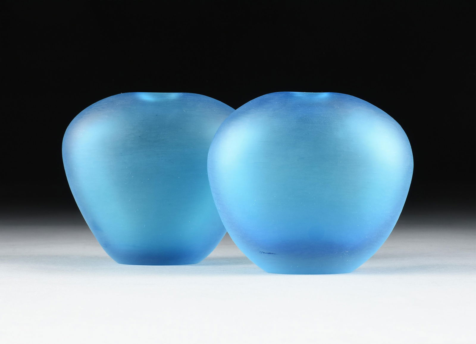 LUCIANO GASPARI (Italian 1913-2007) A PAIR OF SALVIATI BLUE MURANO VASES, ITALIAN, CIRCA 1998,: LUCIANO GASPARI (Italian 1913-2007) A PAIR OF SALVIATI BLUE MURANO VASES, ITALIAN, CIRCA 1998,a pair of frosted blown glass vases, marked on base, "Salviati."Each: 5 1/2 x 6 1/2 x 4 in. (14 x 16.5 x 1