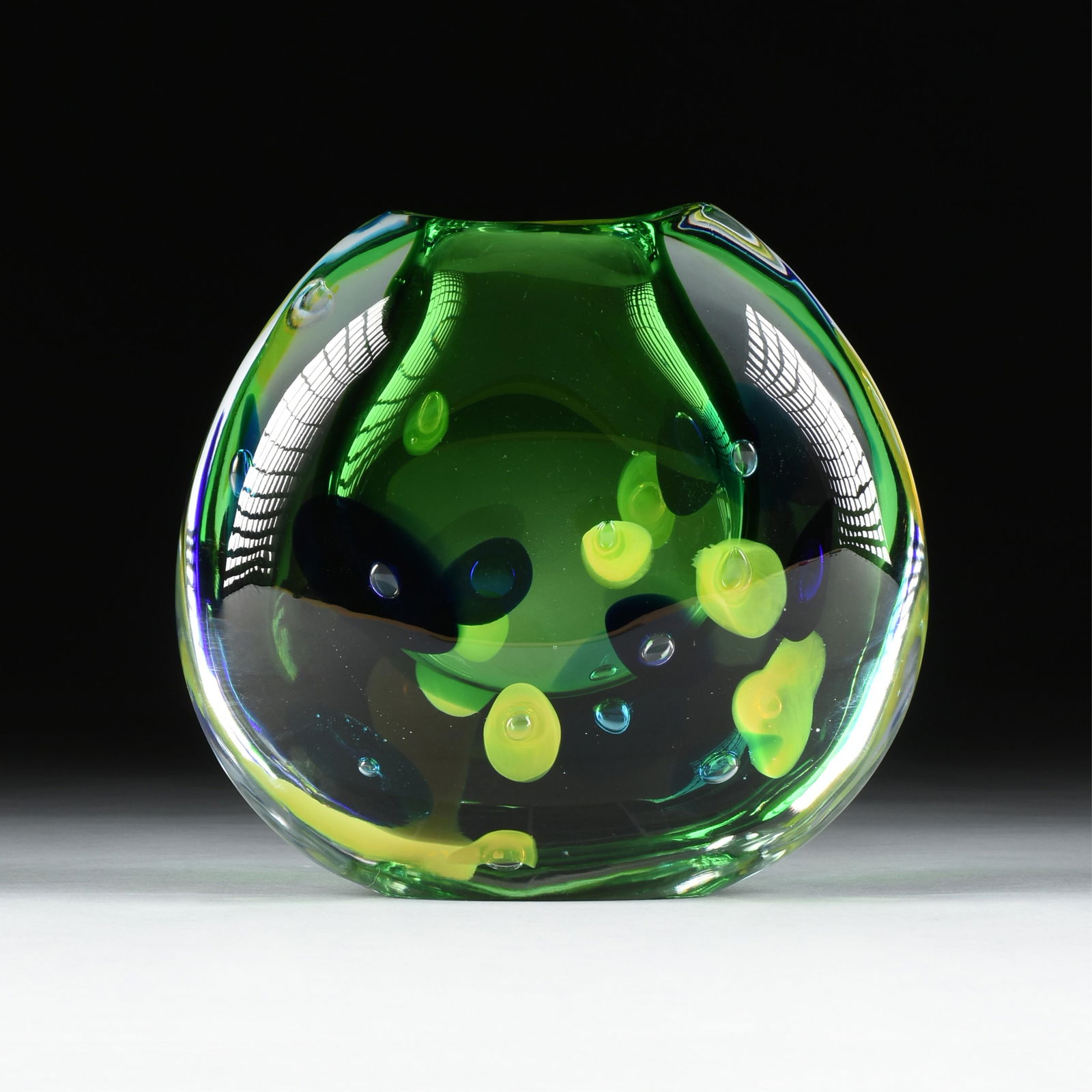 SIMONE CENEDESE (Italian b. 1973) A "Sommerso" MURANO VASE, LATE 20TH CENTURY,: SIMONE CENEDESE (Italian b. 1973) A "Sommerso" MURANO VASE, LATE 20TH CENTURY,green, blue and yellow glass, etched at base, "Simone Cenedese Murano."10 x 11 x 4 1/2 in. (25.4 x 27.9 x 11.4 cm.)