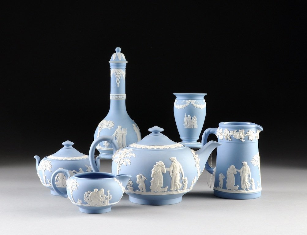 SIX WEDGWOOD BLUE AND WHITE DIP JASPER WARES, ENGLAND, : SIX WEDGWOOD BLUE AND WHITE DIP JASPER WARES, ENGLAND, LATE 19TH/EARLY 20TH CENTURY, comprised of a lidded bottle with long slender neck and bulbous body depicting classical figures beneath olive tree