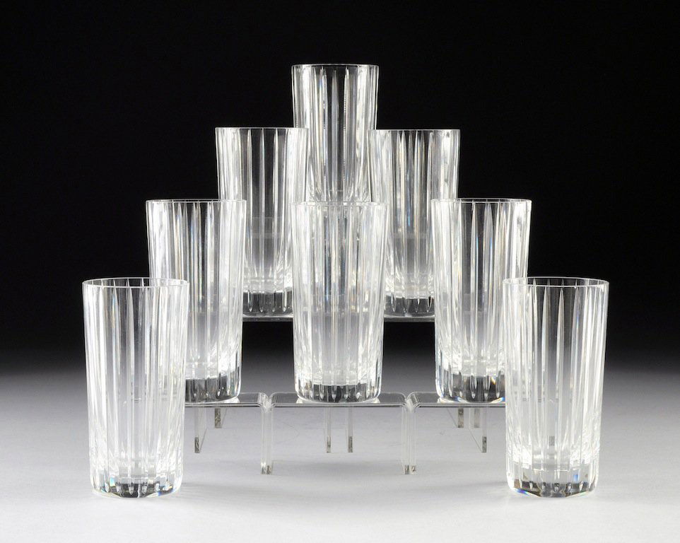A SET OF EIGHT BACCARAT CUT CRYSTAL HIGHBOYS, HARMONIE : A SET OF EIGHT BACCARAT CUT CRYSTAL HIGHBOYS, HARMONIE PATTERN, SIGNED, MODERN, each with vertical line cut sides enclosing an underside with circular Baccarat mark, 11 1/2 oz. Height: 5 1/2"