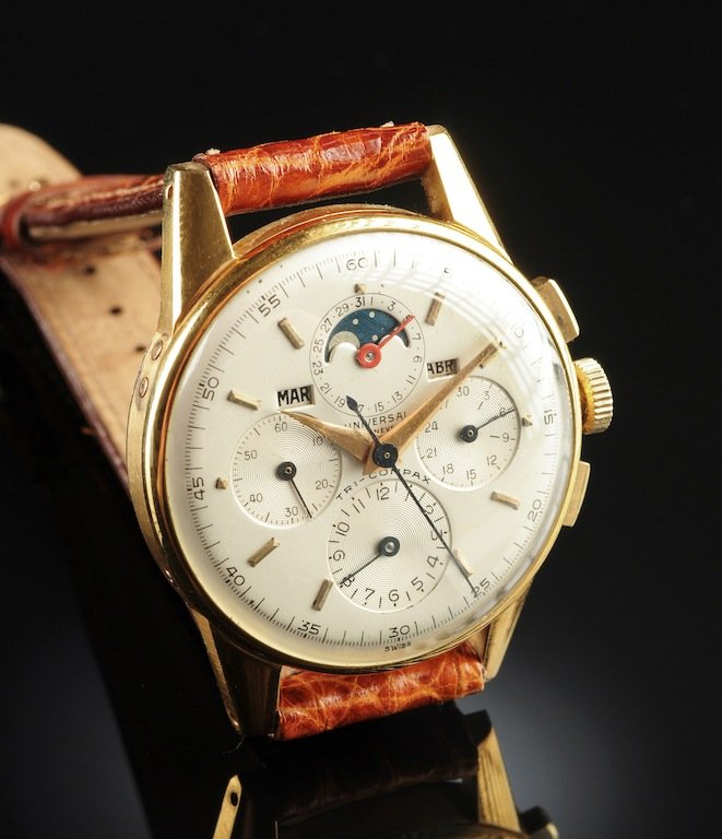 A UNIVERSAL GENEVE STAINLESS STEEL AND GOLD TRIPLE CALE: A UNIVERSAL GENEVE STAINLESS STEEL AND GOLD TRIPLE CALENDAR MOONPHASE CHRONOGRAPH GENT'S VINTAGE WATCH, Complicated, collectible Tri-Compax. Signed Universal Geneve, case is gold tone with back in sta
