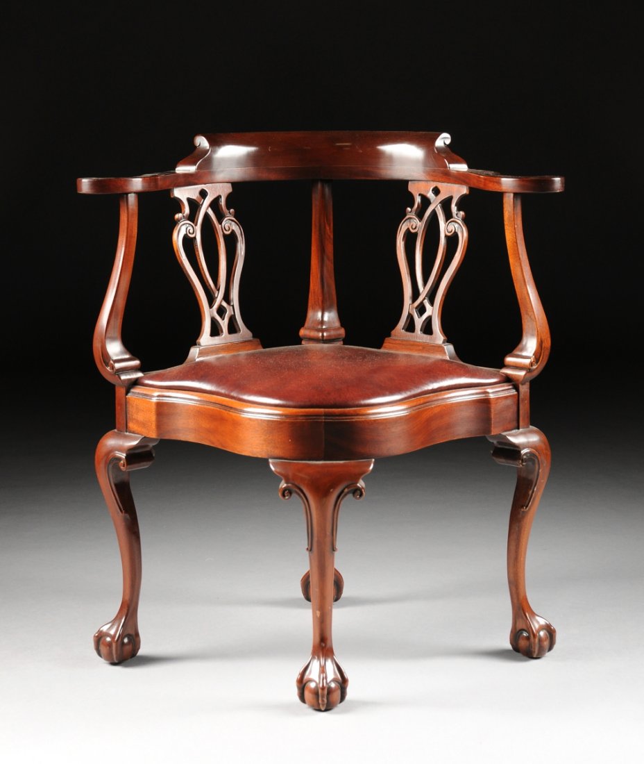 A CHIPPENDALE STYLE CARVED MAHOGANY CORNER CHAIR, BY SO May 05, 2013