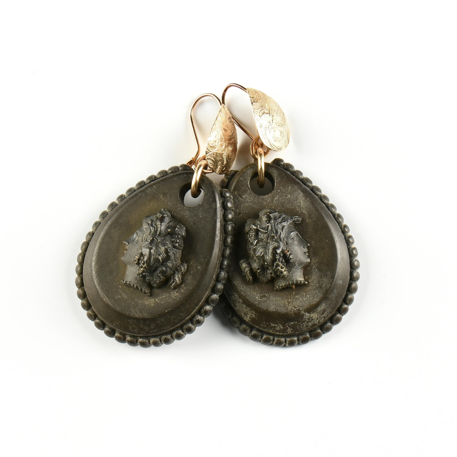 A PAIR OF REVIVAL STYLE VULCANITE EARRINGS, PROBABLY ENGLISH, 19TH CENTURY, (1 of 3)