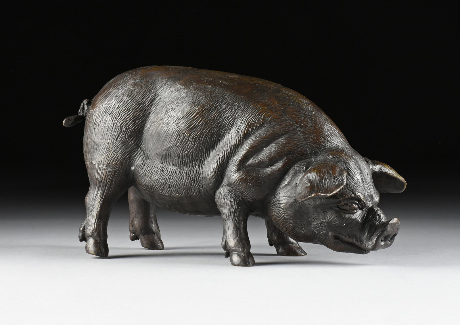 A BRONZE PIG, 20TH CENTURY, (1 of 8)