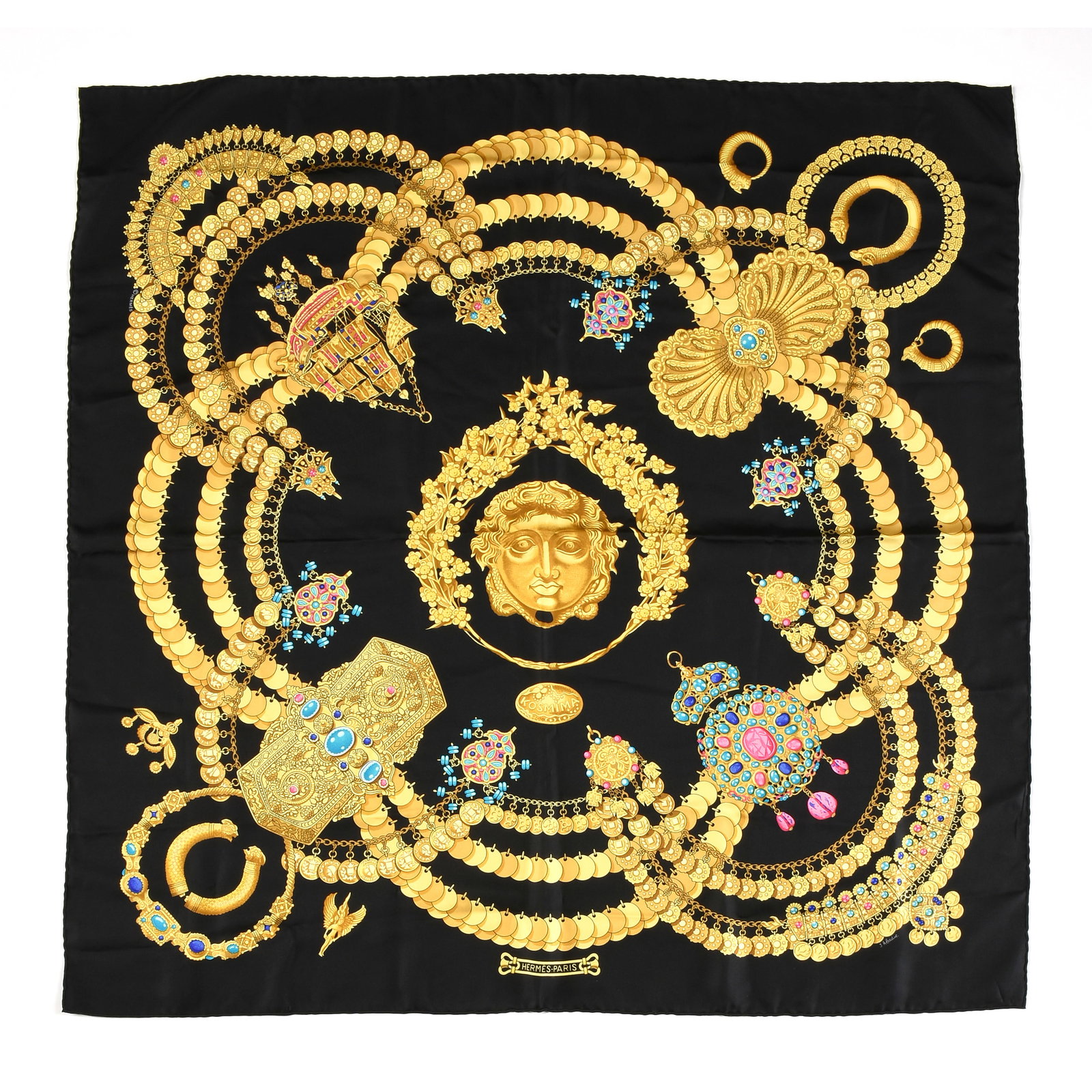 TWO HERMÈS SILK SCARVES, FRENCH, 1990s,: TWO HERMÈS SILK SCARVES, FRENCH, 1990s, two silk scarfs, including one "Kosmima" black silk scarf decorated with printed designs of gold jewelry and with hand rolled edges, and one "Hello Dolly"